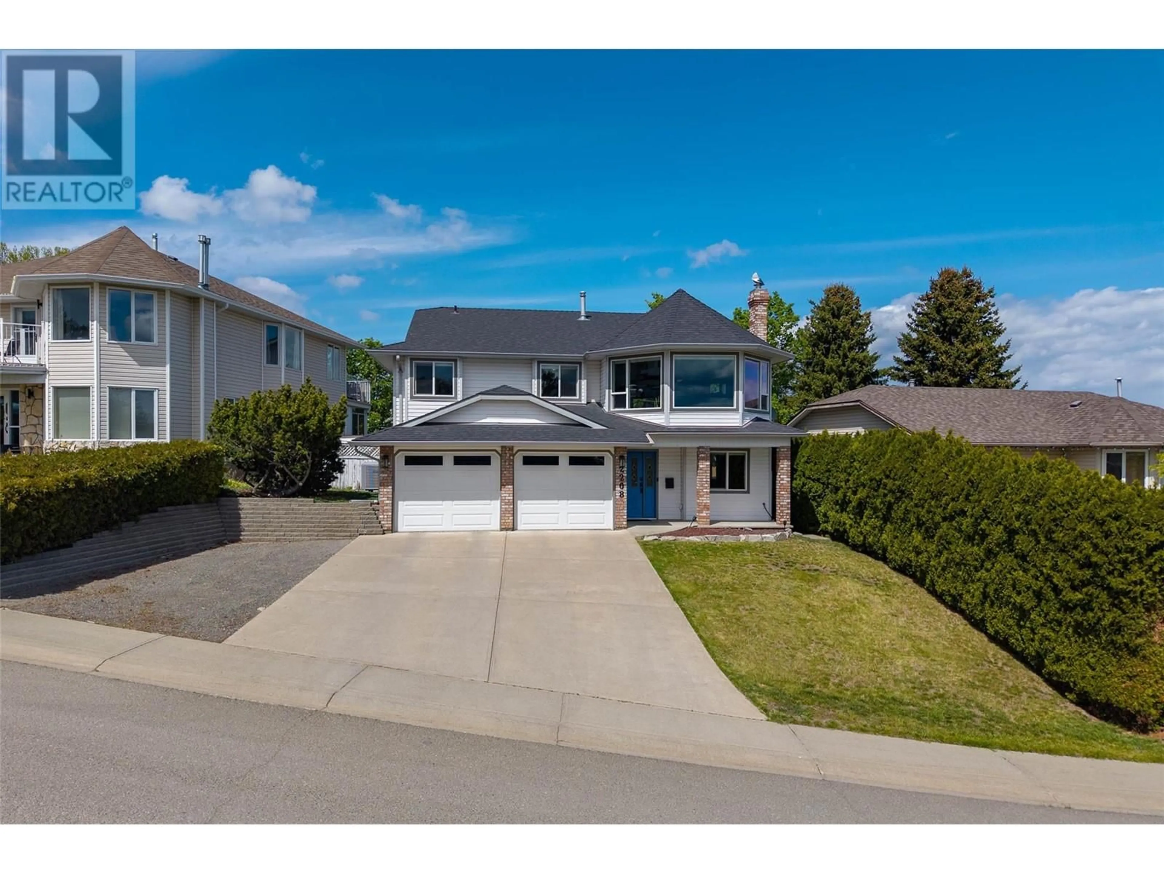 Home with vinyl exterior material, street for 2208 GARYMEDE DRIVE, Kamloops British Columbia V1S1P2