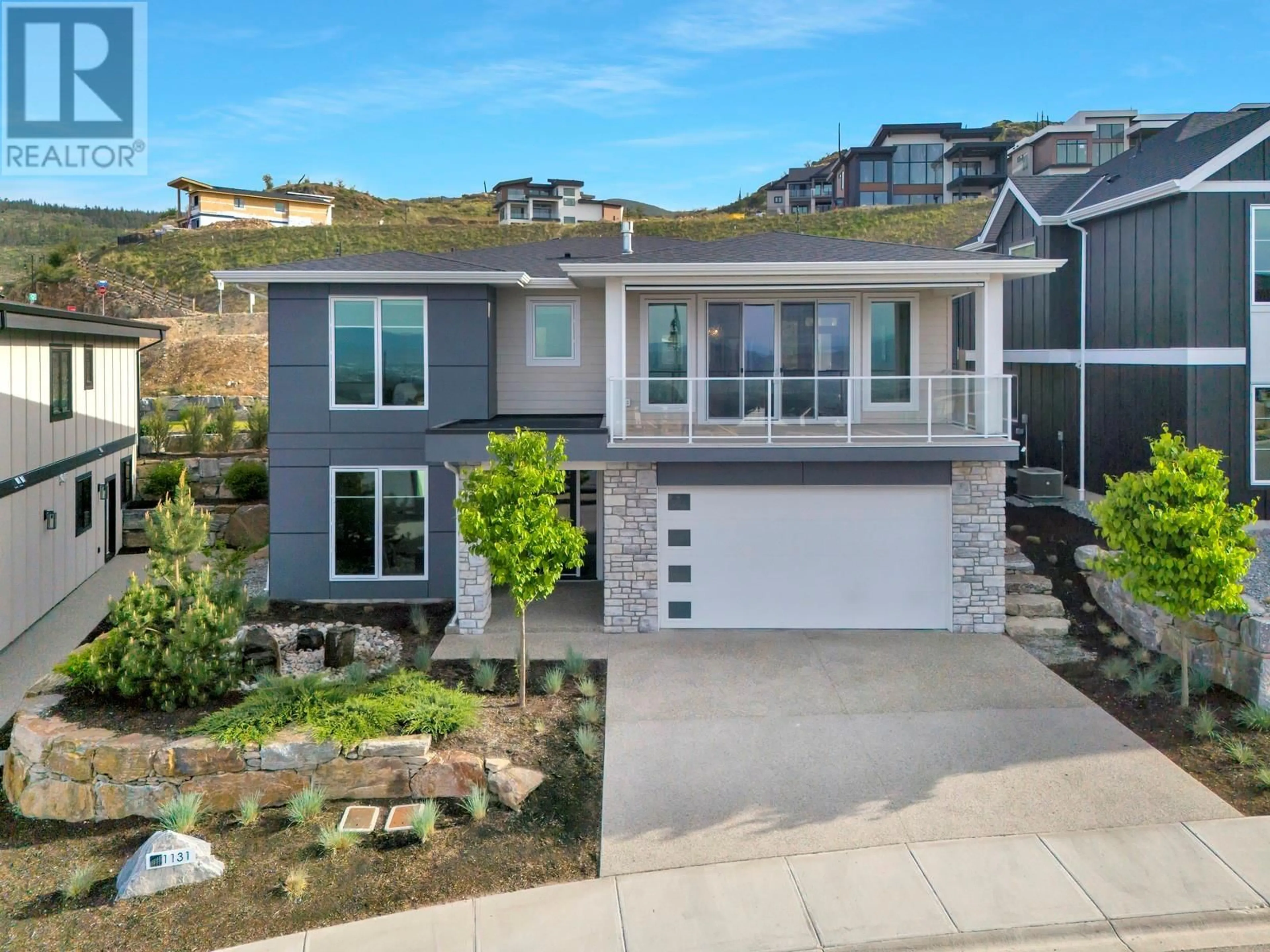 Home with vinyl exterior material, street for 1131 COLLINSON COURT, Kelowna British Columbia V1W0C3