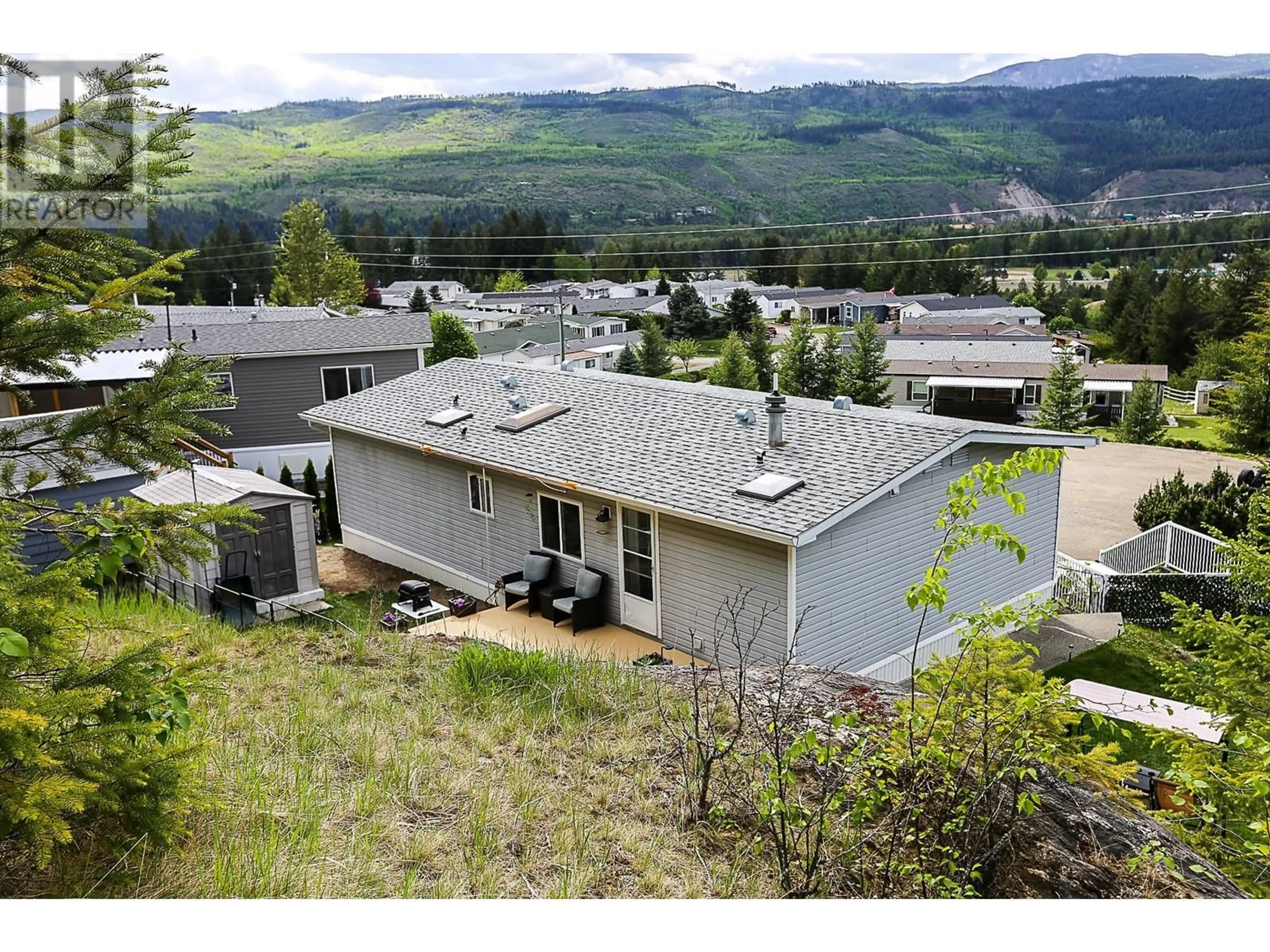 A pic from outside/outdoor area/front of a property/back of a property/a pic from drone, mountain view for 45 - 4510 POWER ROAD, Barriere British Columbia V0E1E0