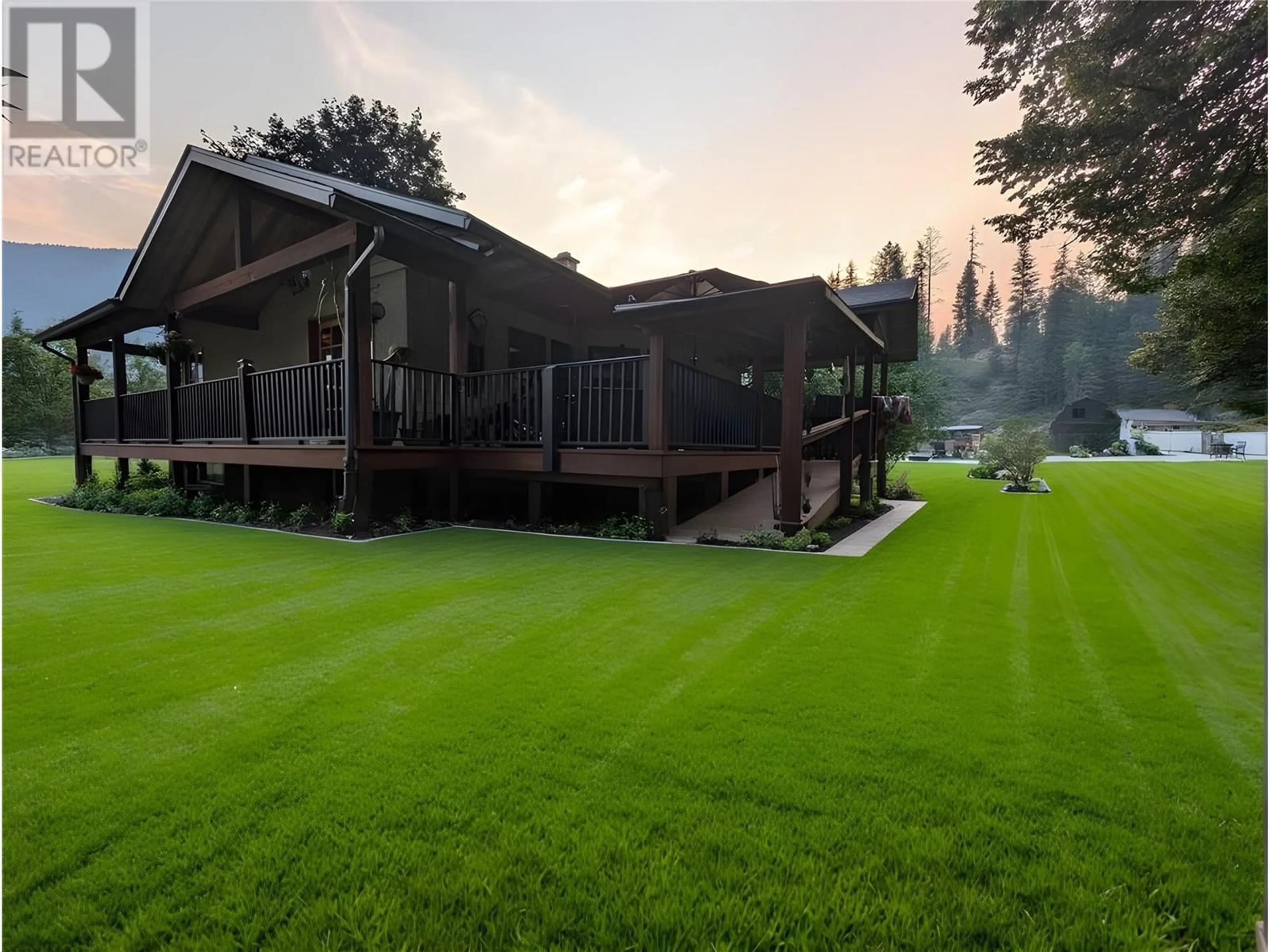 A pic from outside/outdoor area/front of a property/back of a property/a pic from drone, unknown for 2398 CUNNINGHAM ROAD, Slocan Park British Columbia V0G2E0