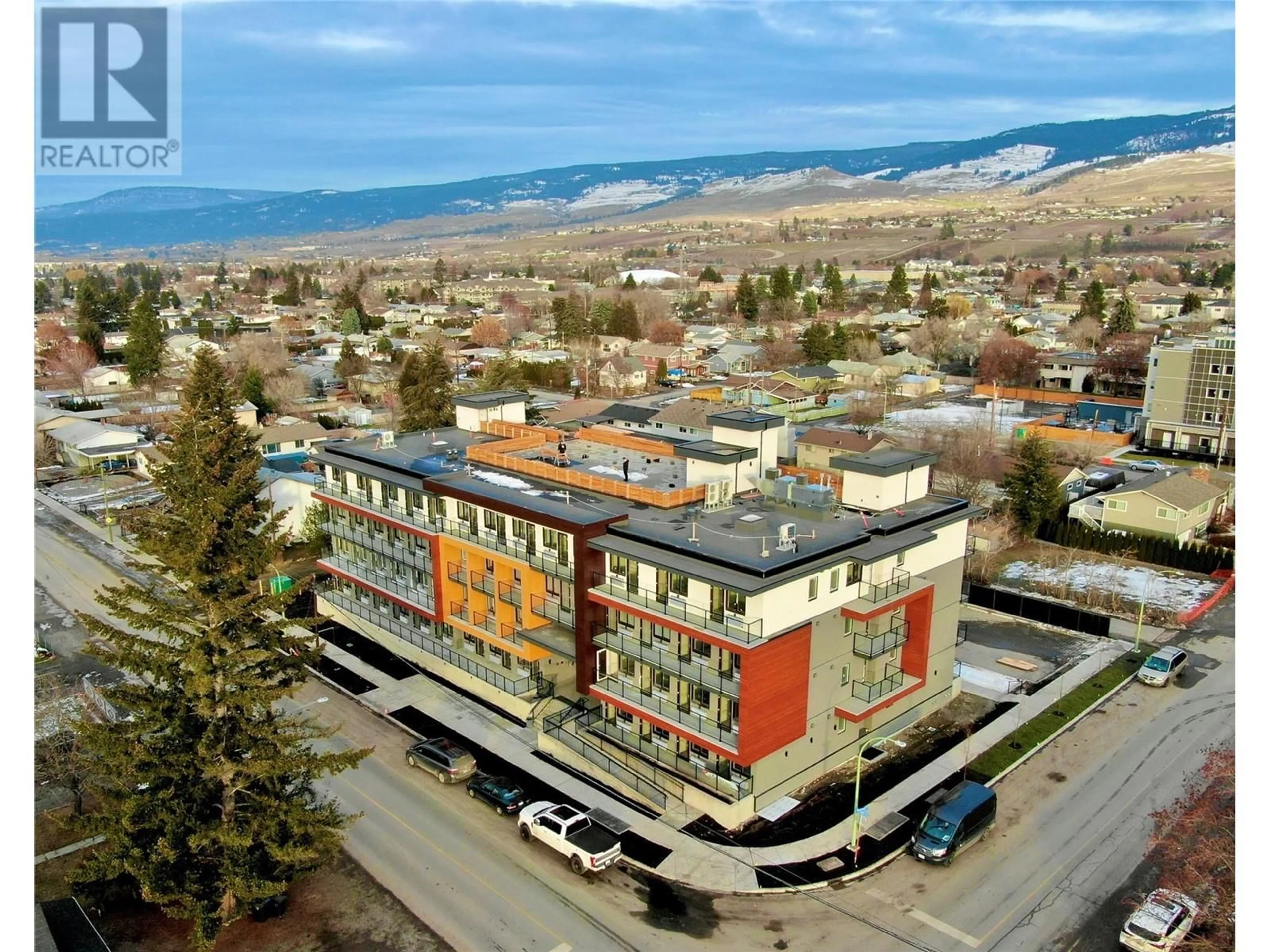 A pic from outside/outdoor area/front of a property/back of a property/a pic from drone, unknown for PH16 - 345 DOUGALL RD N ROAD, Kelowna British Columbia V1X0A8