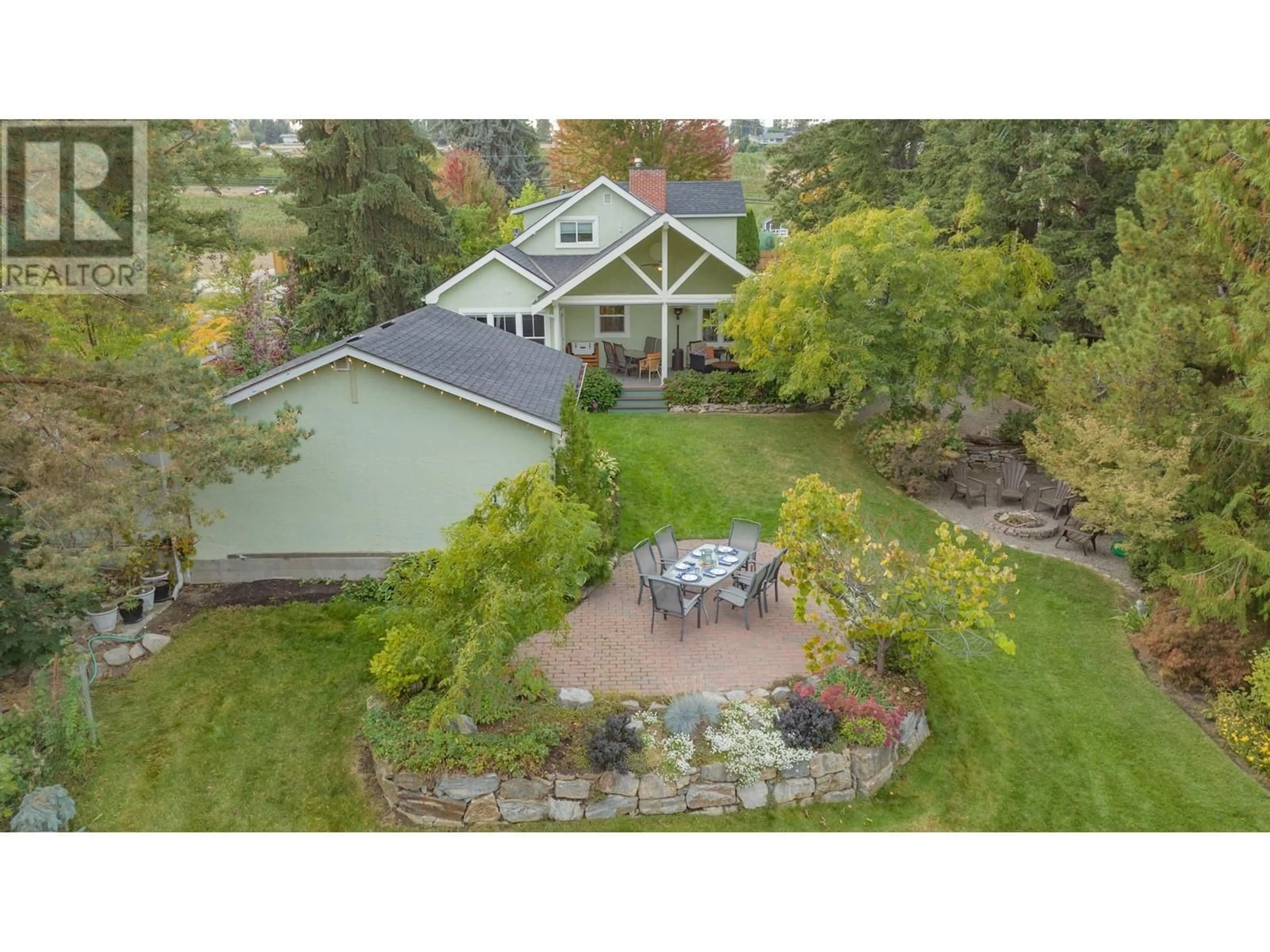 A pic from outside/outdoor area/front of a property/back of a property/a pic from drone, water/lake/river/ocean view for 11327 OKANAGAN CENTRE ROAD EAST, Lake Country British Columbia V4V1G7
