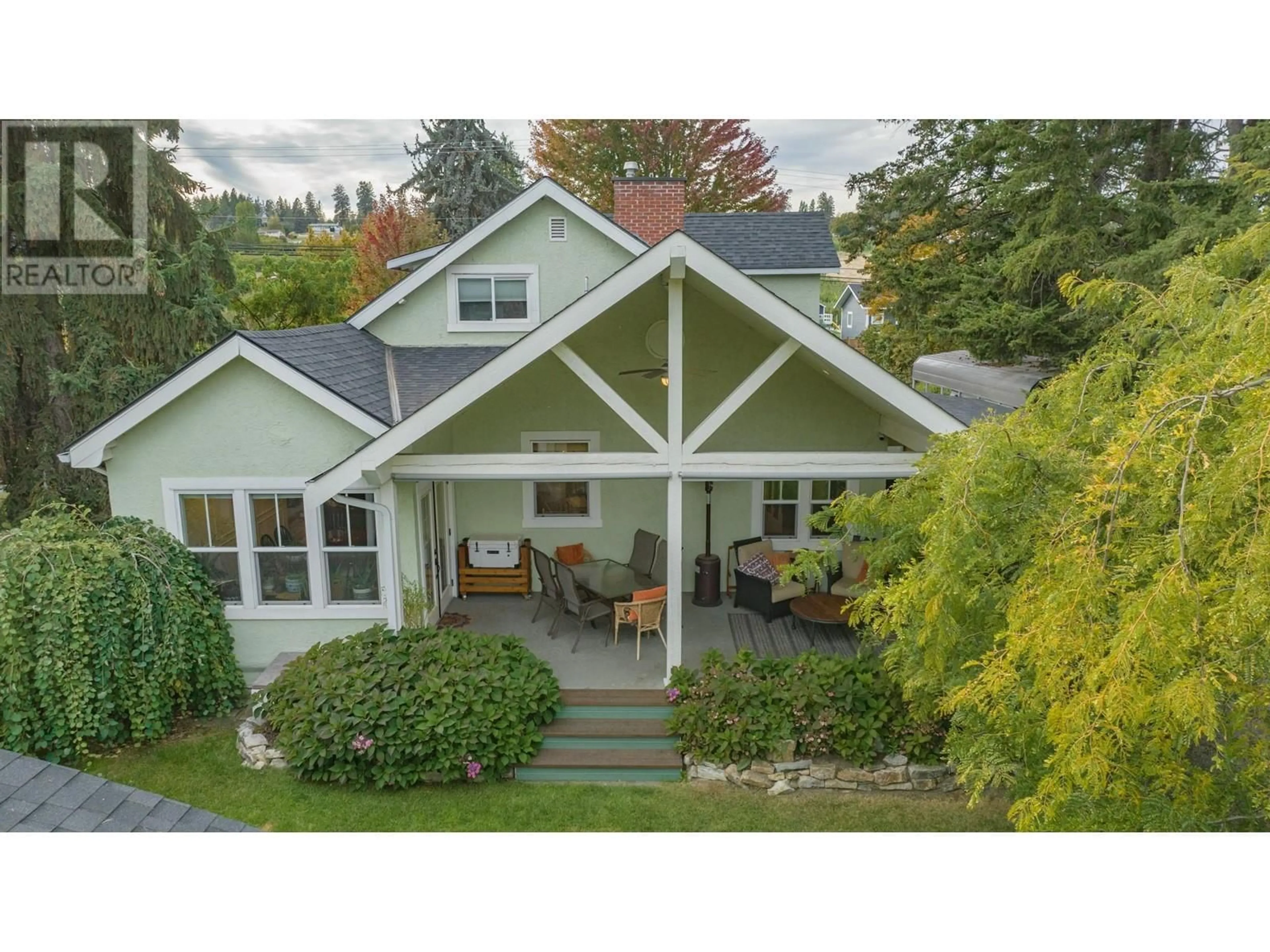 Home with vinyl exterior material, street for 11327 OKANAGAN CENTRE ROAD EAST, Lake Country British Columbia V4V1G7