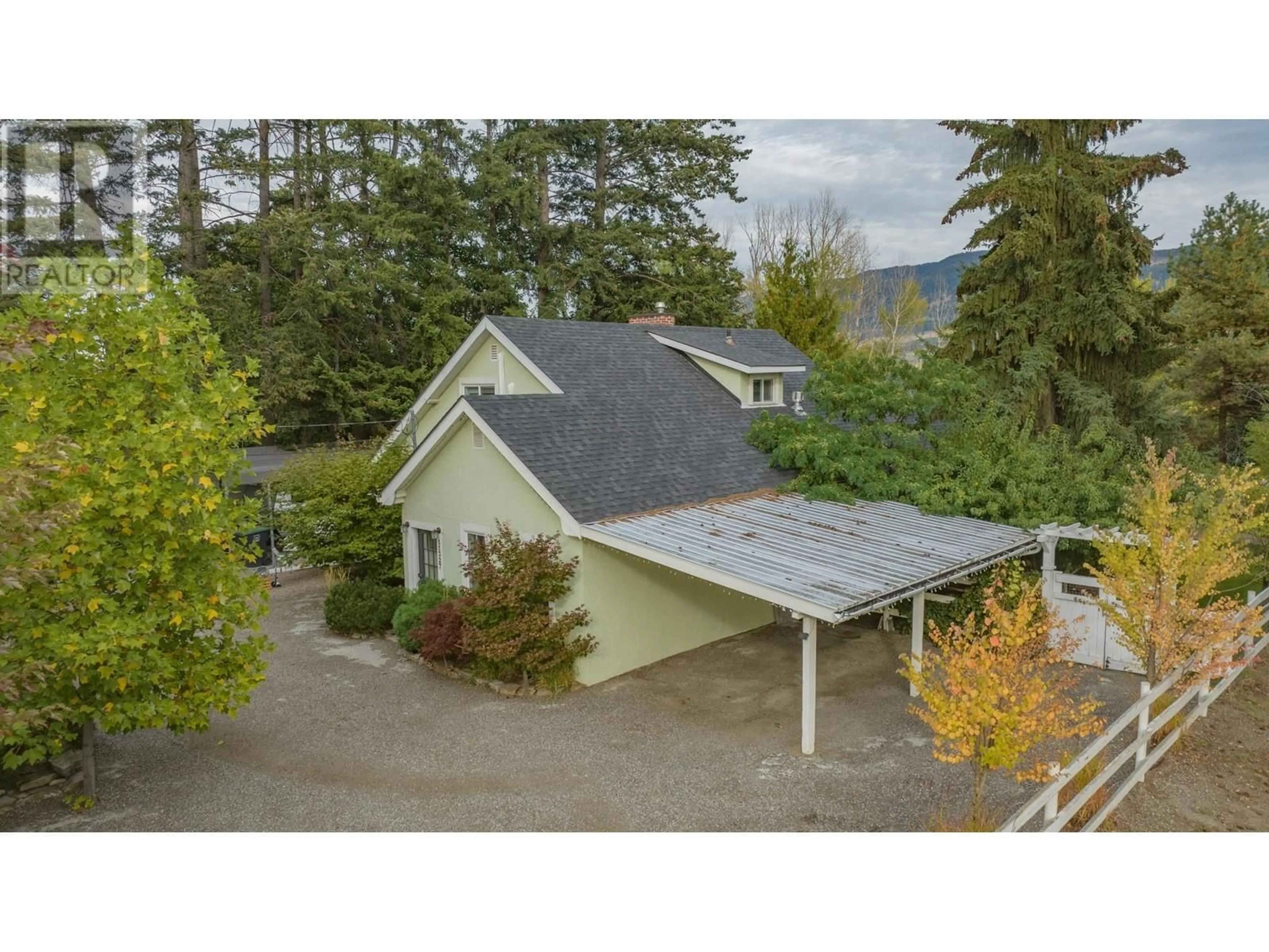 A pic from outside/outdoor area/front of a property/back of a property/a pic from drone, unknown for 11327 OKANAGAN CENTRE ROAD EAST, Lake Country British Columbia V4V1G7