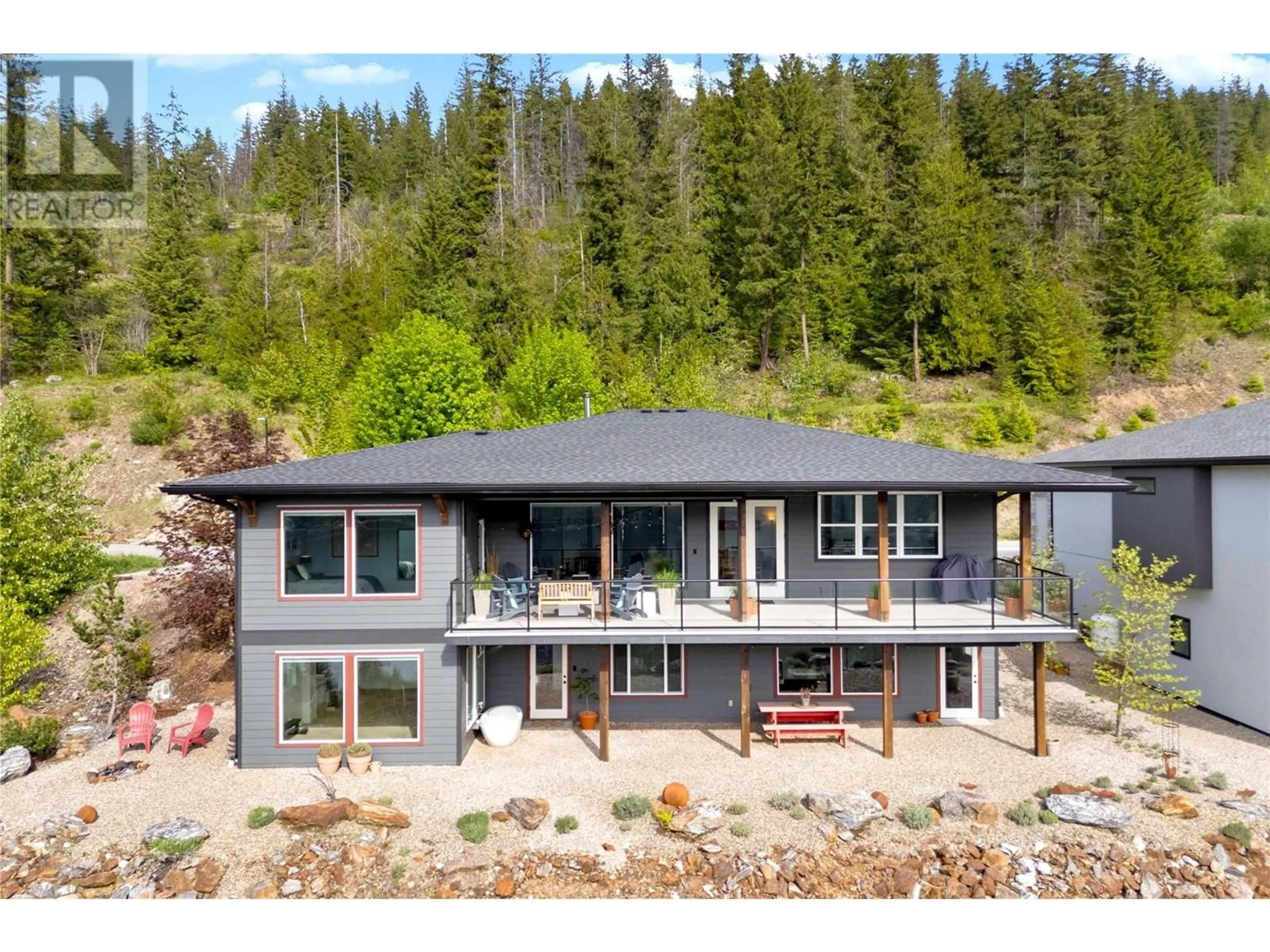 A pic from outside/outdoor area/front of a property/back of a property/a pic from drone, water/lake/river/ocean view for 218 SUNSET DRIVE, Sicamous British Columbia V0E2V1