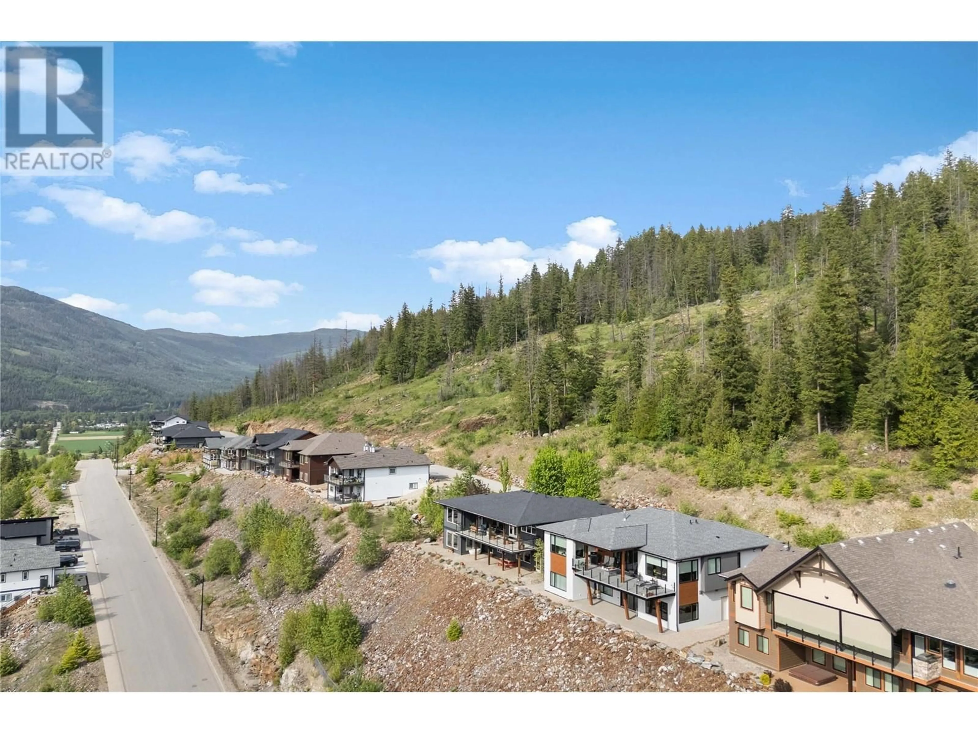 A pic from outside/outdoor area/front of a property/back of a property/a pic from drone, mountain view for 218 SUNSET DRIVE, Sicamous British Columbia V0E2V1