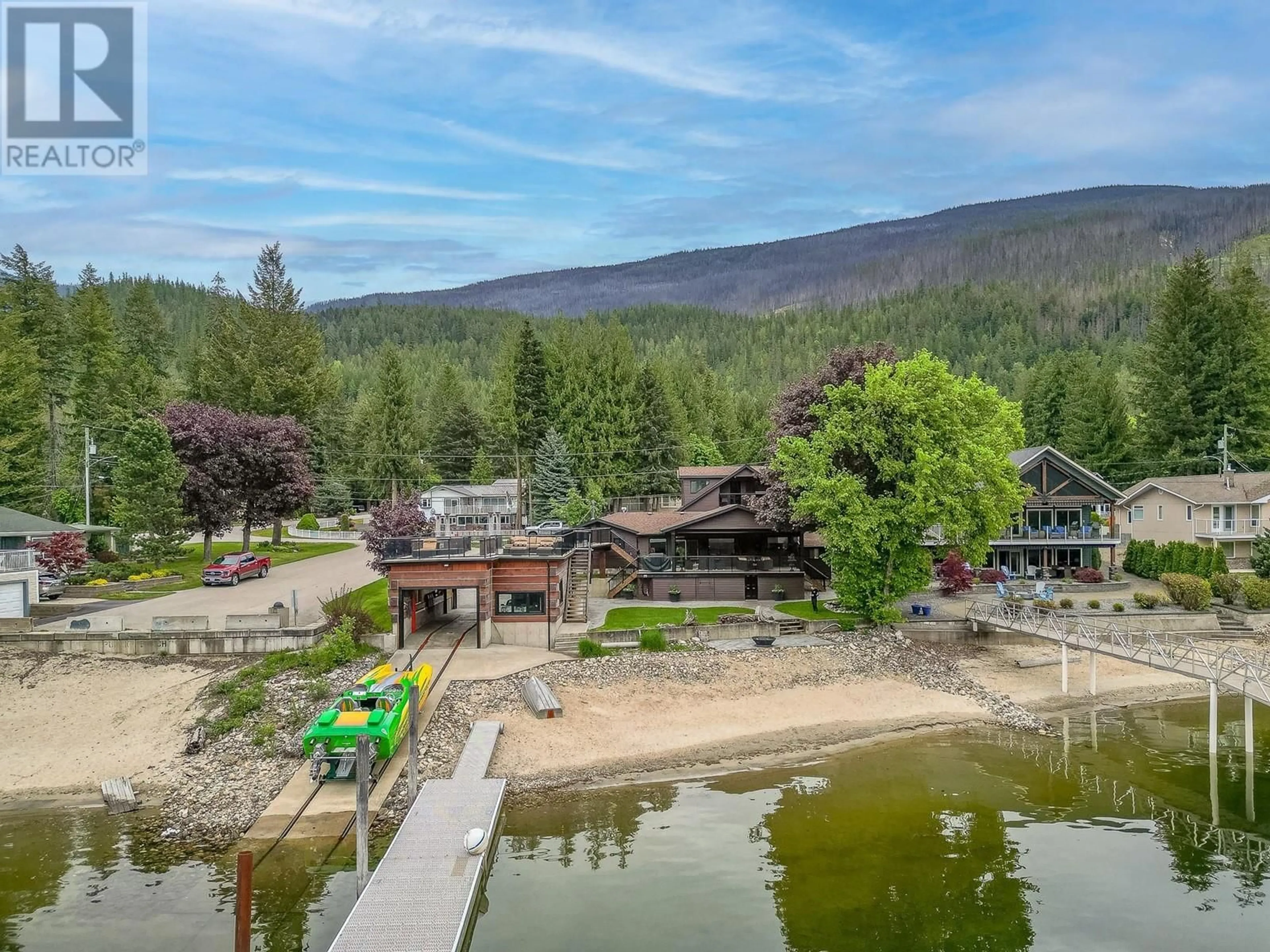 A pic from outside/outdoor area/front of a property/back of a property/a pic from drone, water/lake/river/ocean view for 78 MONTCALM CRESCENT, Sicamous British Columbia V0E2V1