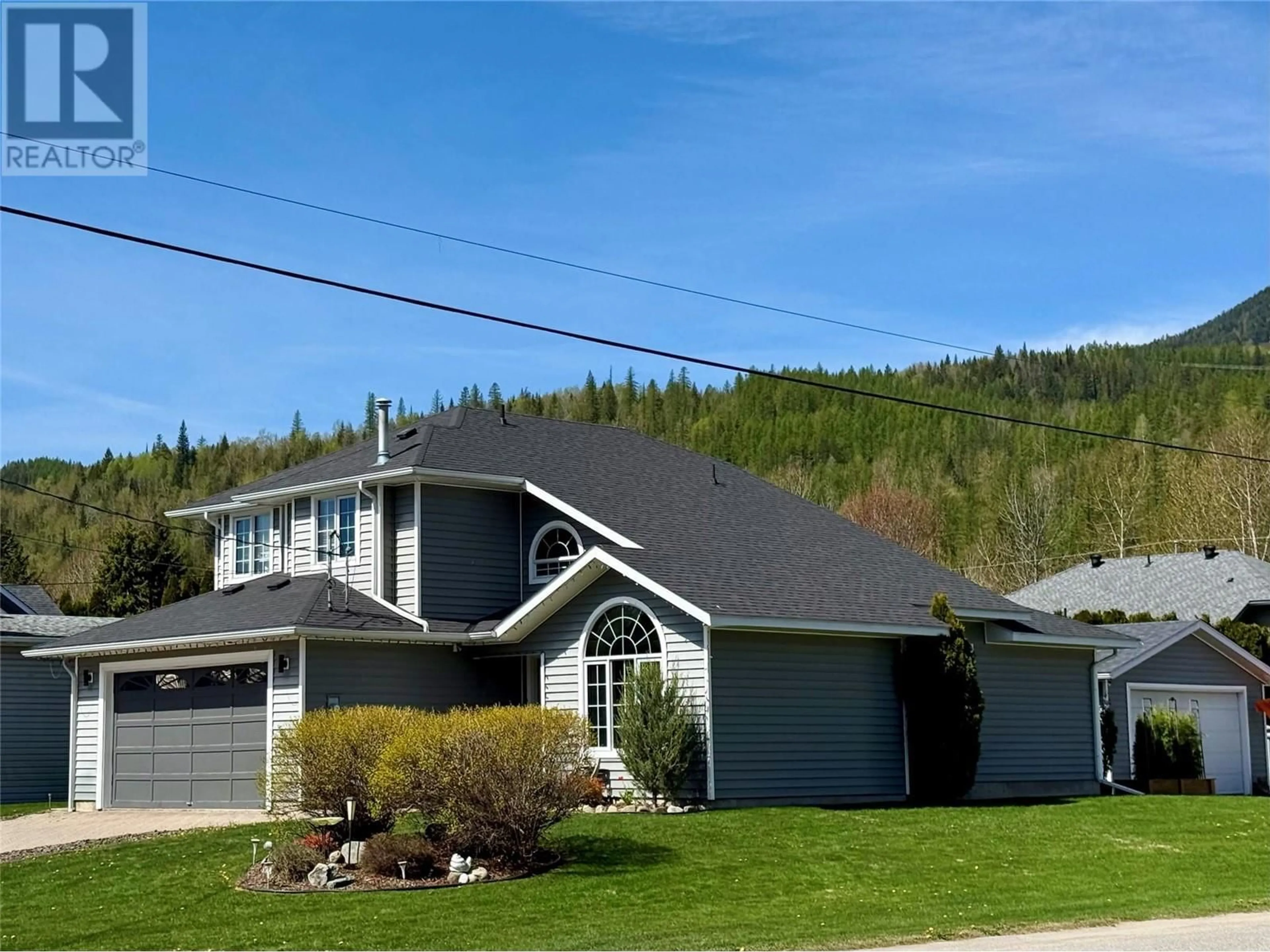 Home with vinyl exterior material, street for 1291 11TH AVENUE, Fernie British Columbia V0B1M0