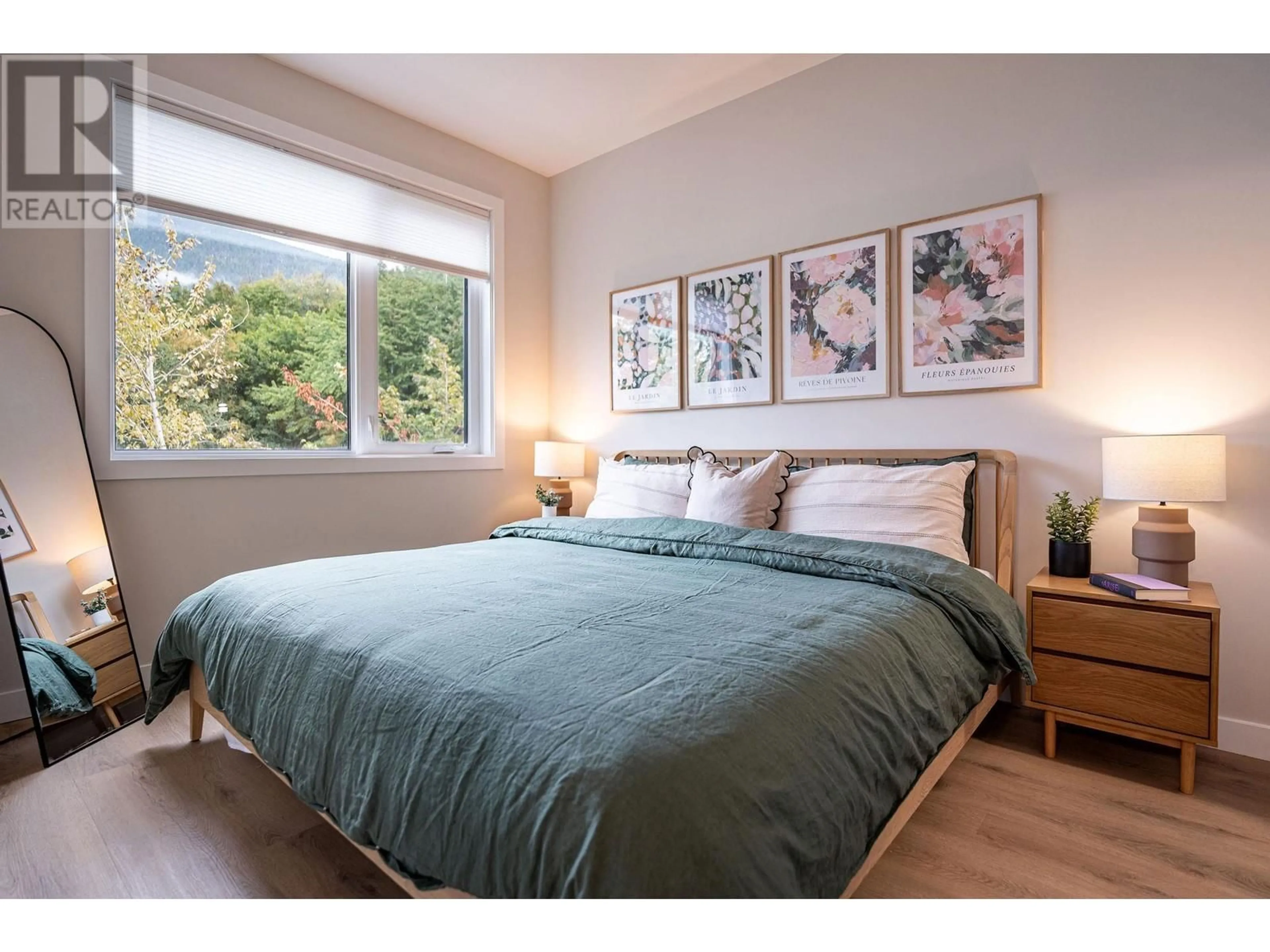 Bedroom with bed, wood/laminate floor for 1208 DOUGLAS STREET WEST, Revelstoke British Columbia V0E2S0