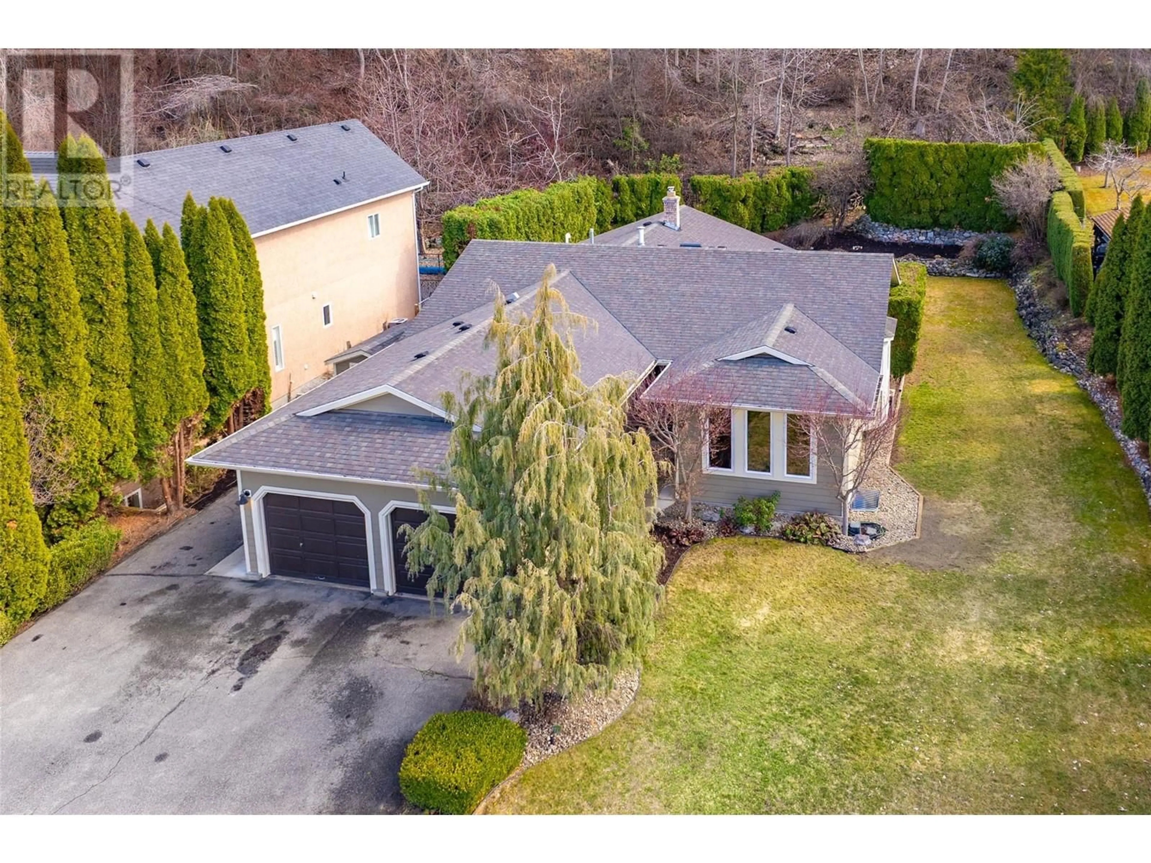 A pic from outside/outdoor area/front of a property/back of a property/a pic from drone, street for 2643 O'REILLY ROAD, Kelowna British Columbia V1W2X9