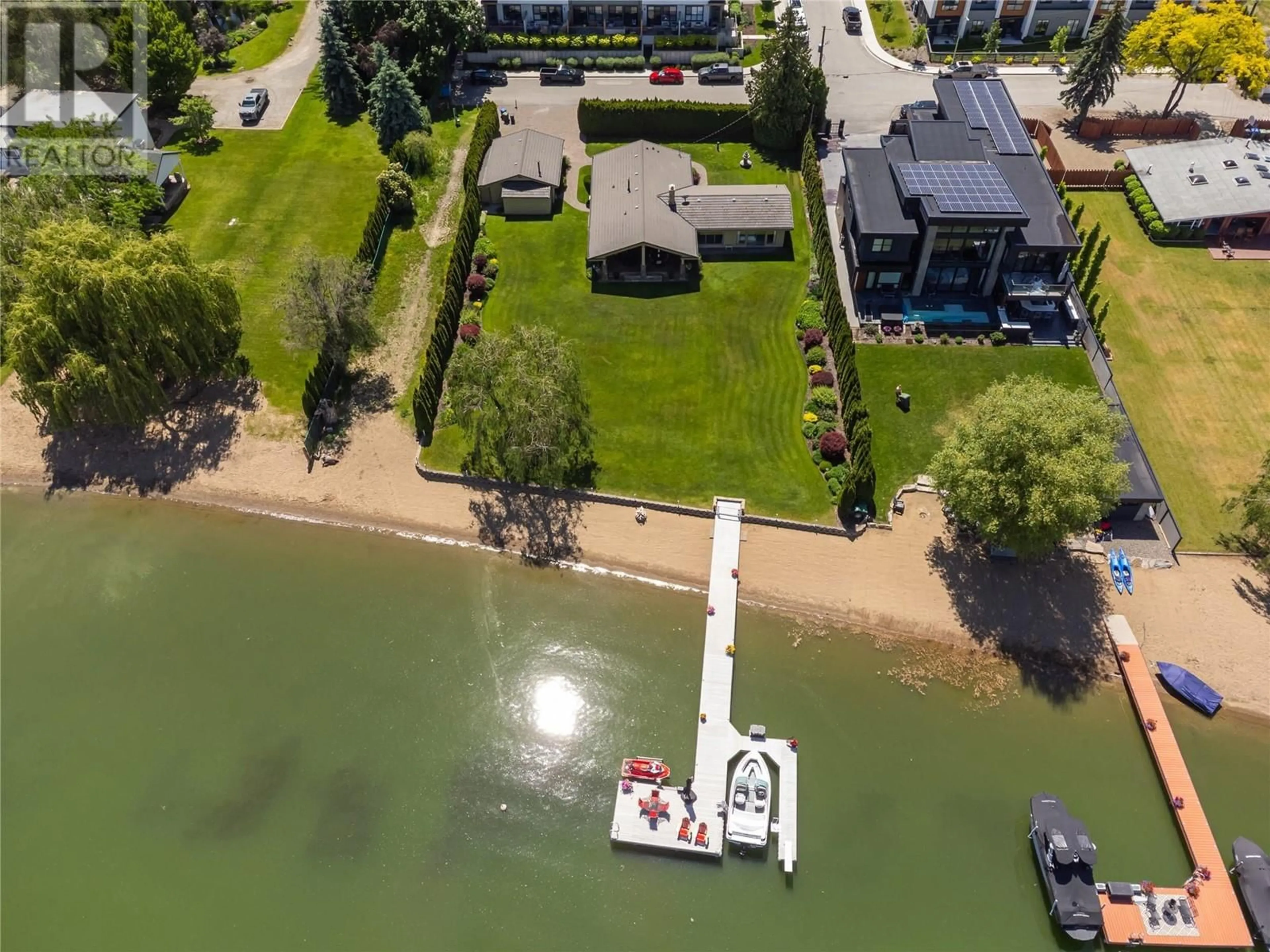 A pic from outside/outdoor area/front of a property/back of a property/a pic from drone, water/lake/river/ocean view for 11640 ROGERS ROAD, Lake Country British Columbia V4V1X8