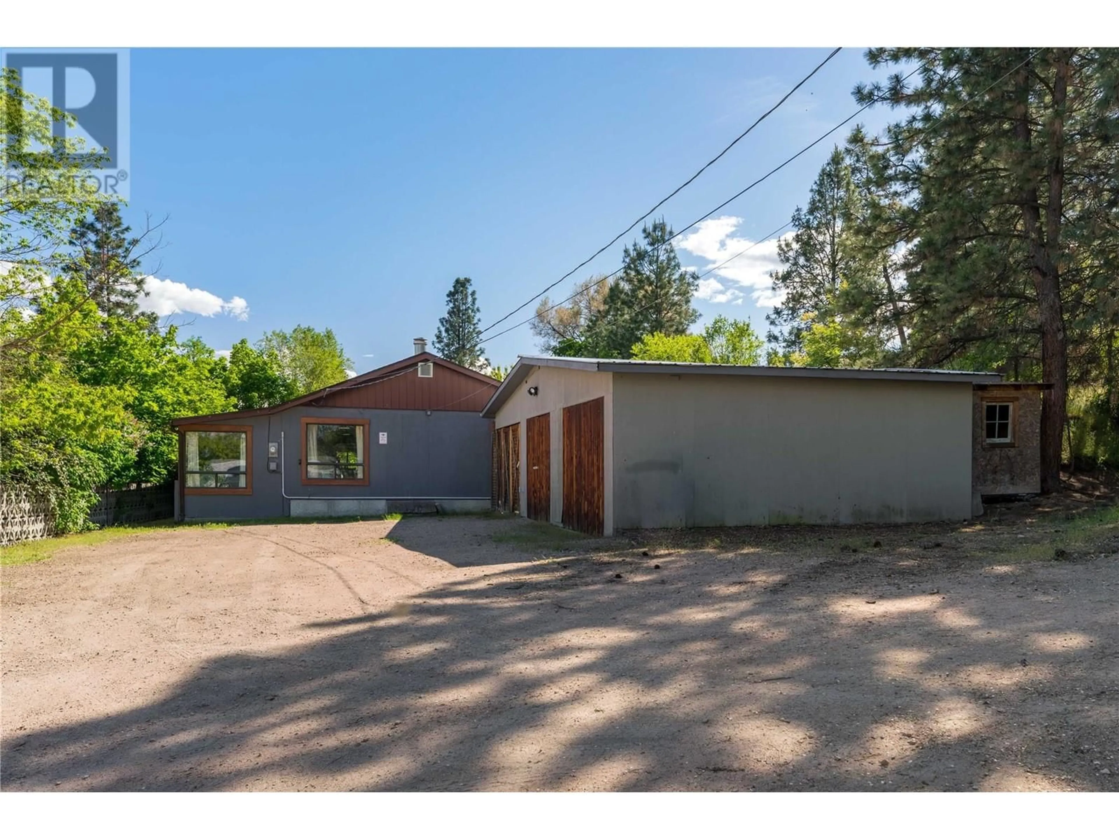 A pic from outside/outdoor area/front of a property/back of a property/a pic from drone, street for 10286 NEWENE ROAD, Lake Country British Columbia V4V1V2