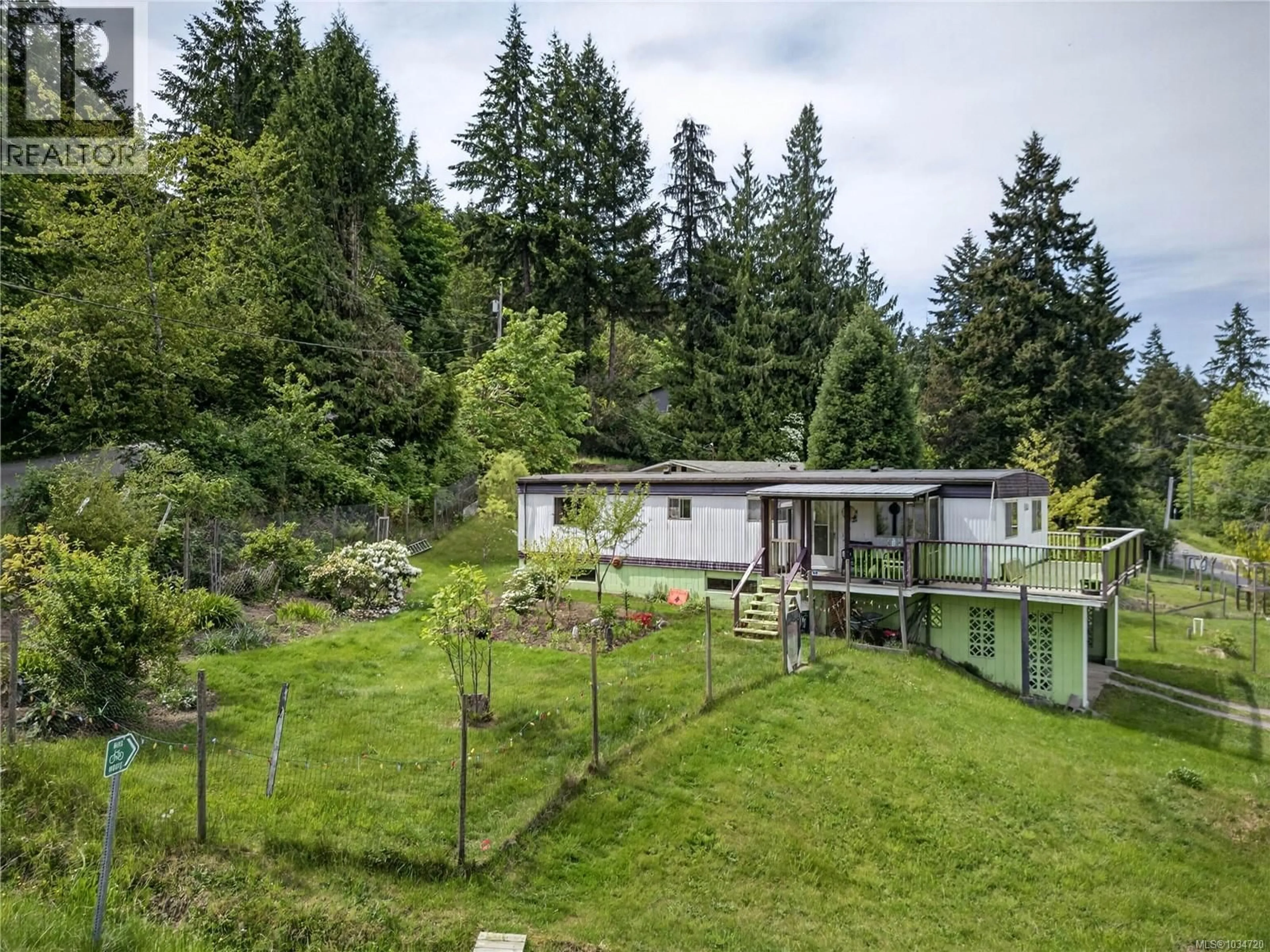A pic from outside/outdoor area/front of a property/back of a property/a pic from drone, forest/trees view for 104 MOBRAE AVENUE, Salt Spring British Columbia V8K1K1