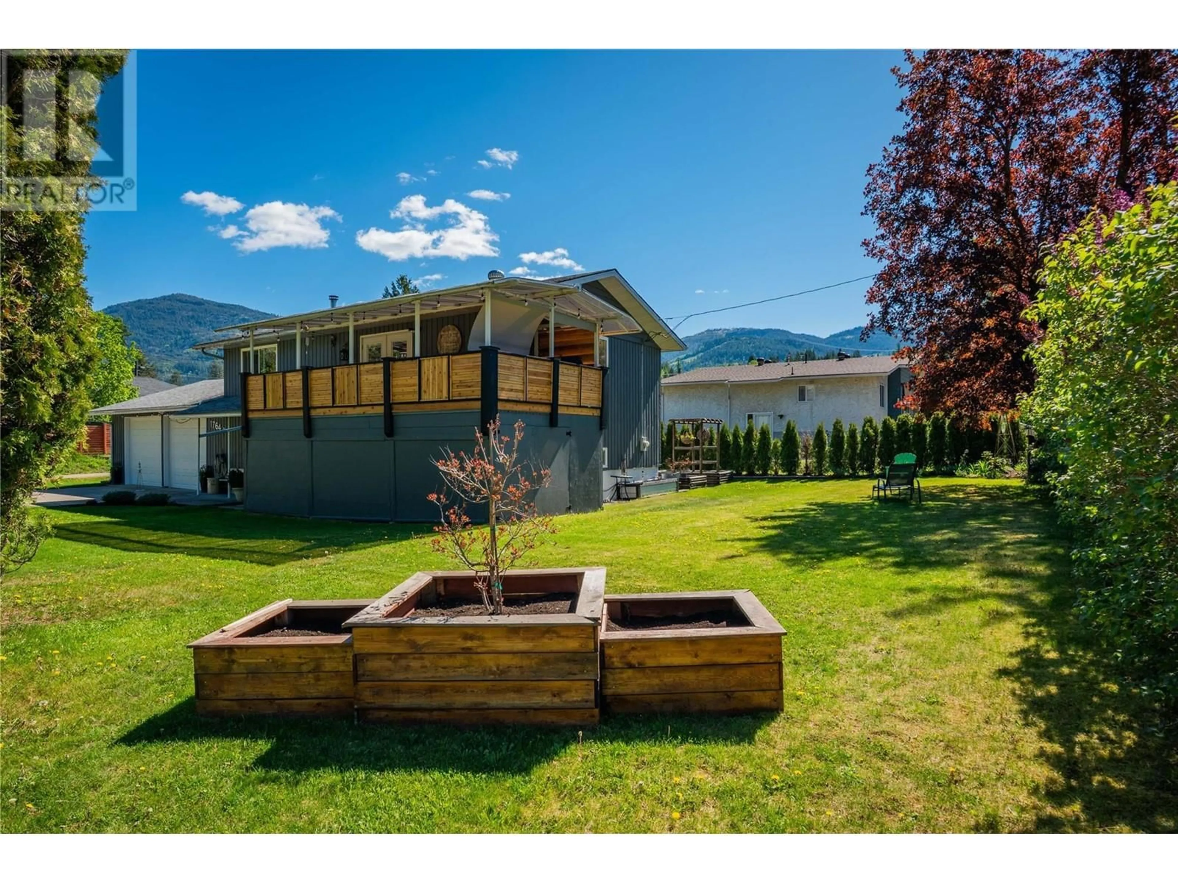 A pic from outside/outdoor area/front of a property/back of a property/a pic from drone, mountain view for 1764 BARRETT DRIVE, Fruitvale British Columbia V0G1L0