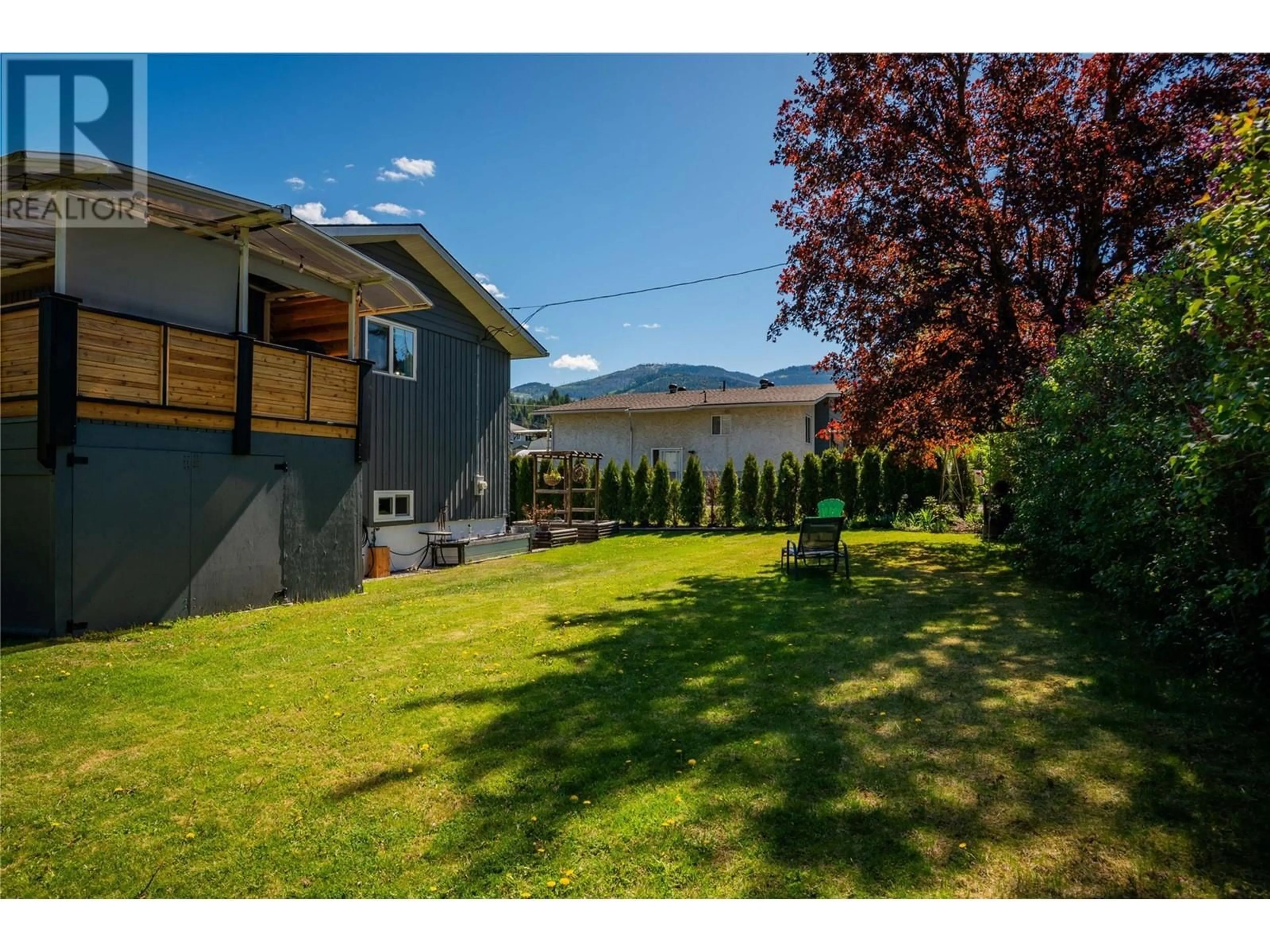 A pic from outside/outdoor area/front of a property/back of a property/a pic from drone, mountain view for 1764 BARRETT DRIVE, Fruitvale British Columbia V0G1L0