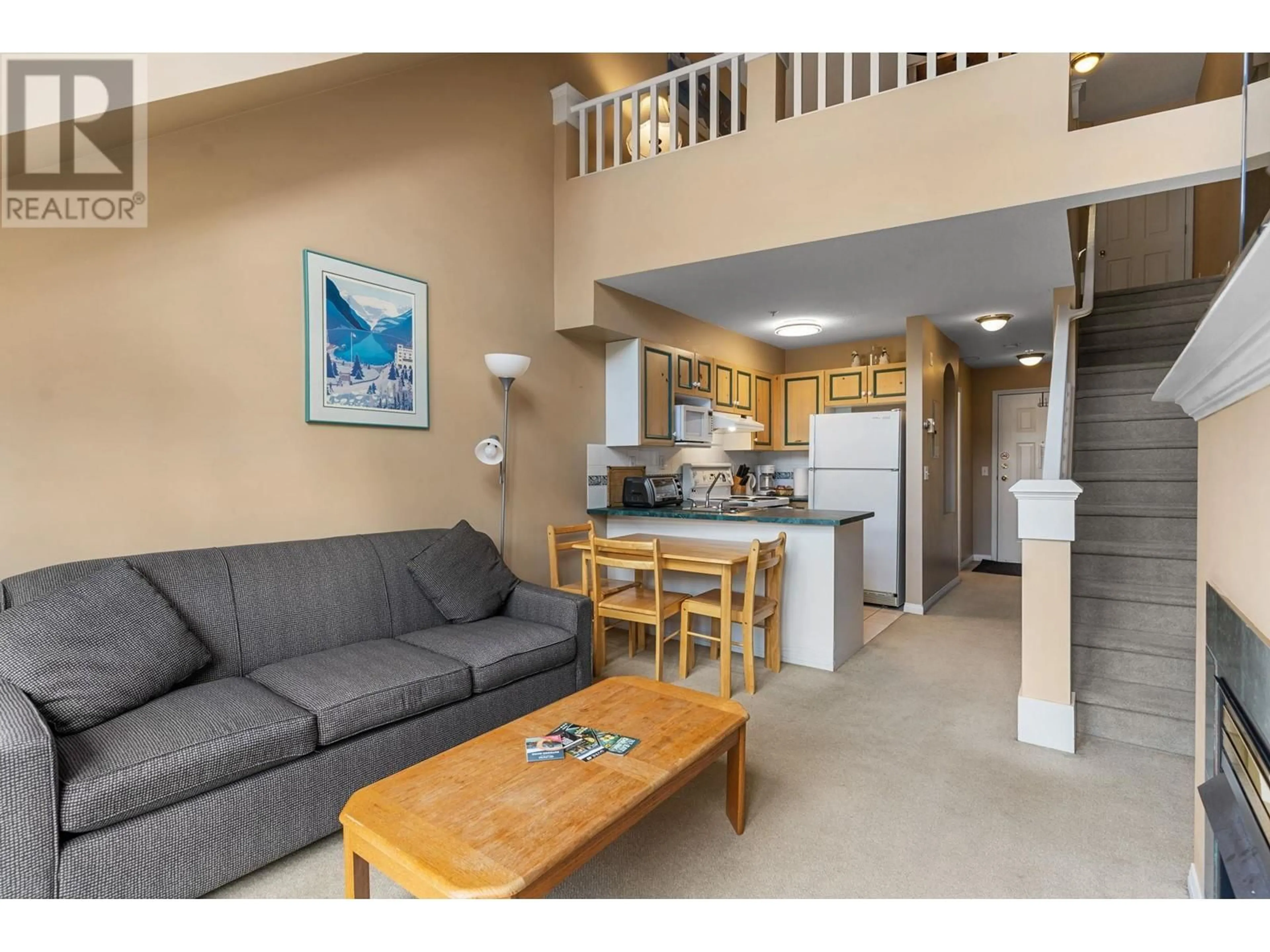 Living room with furniture, unknown for 318 - 3185 VIA CENTRALE OTHER, Kelowna British Columbia V1V2A7
