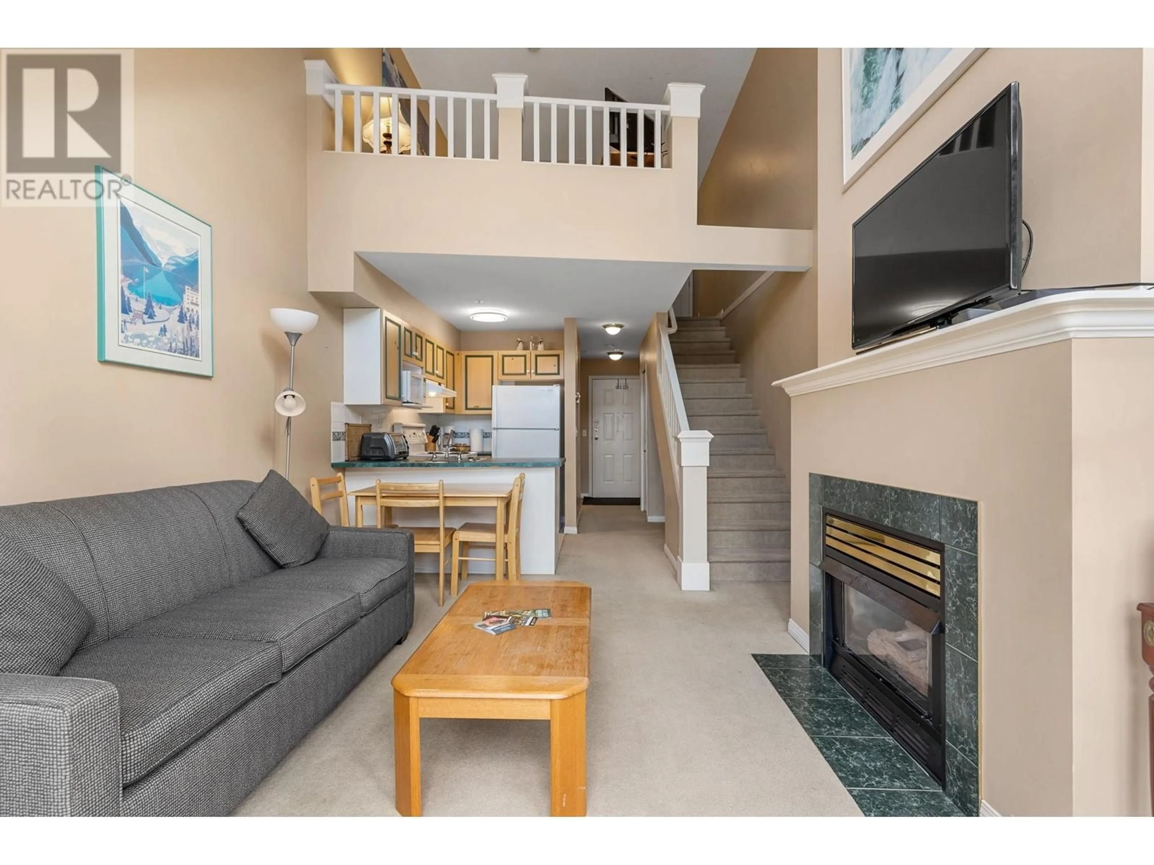 Living room with furniture, unknown for 318 - 3185 VIA CENTRALE OTHER, Kelowna British Columbia V1V2A7