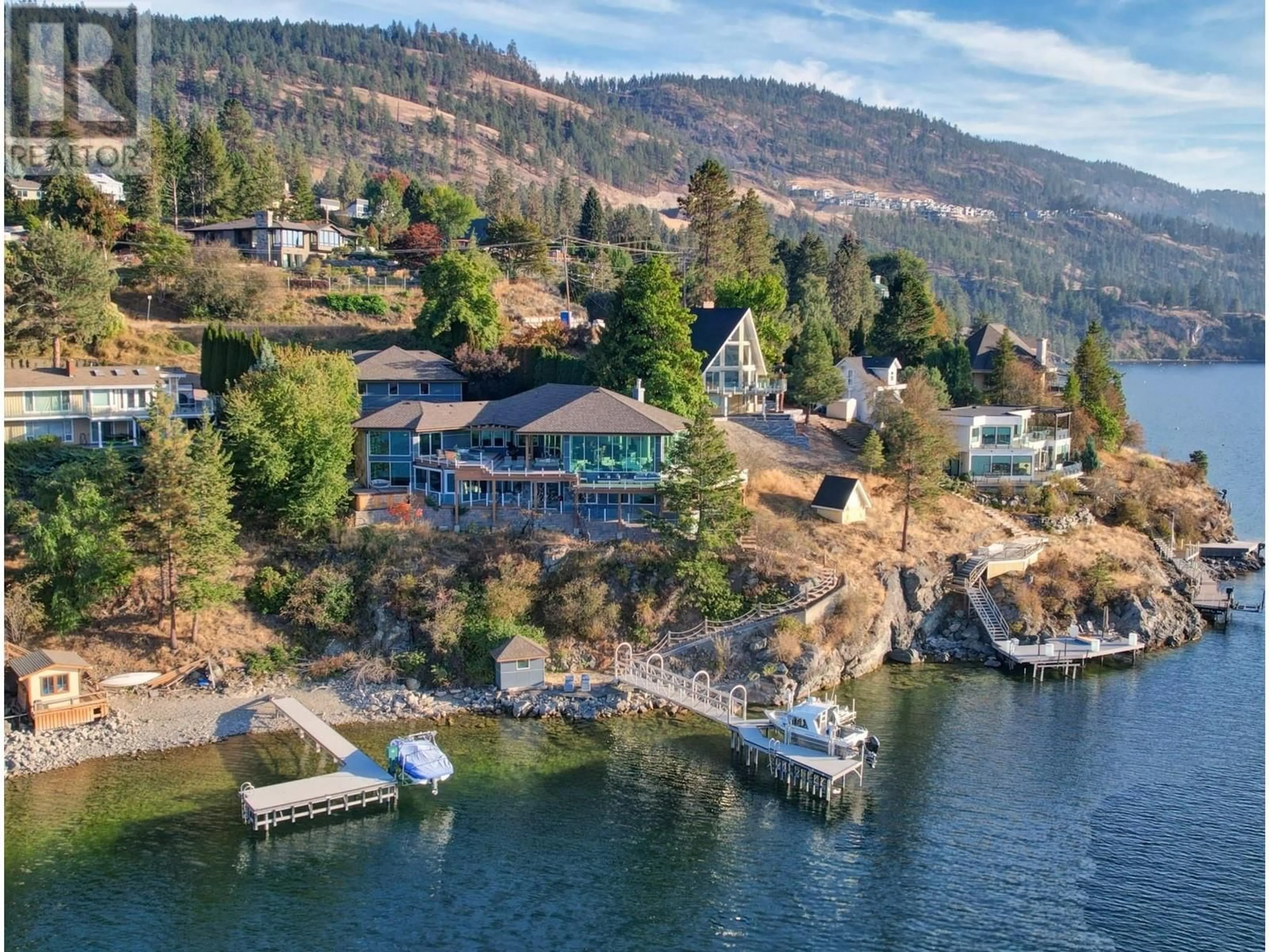 A pic from outside/outdoor area/front of a property/back of a property/a pic from drone, water/lake/river/ocean view for 2100 DEWDNEY ROAD, Kelowna British Columbia V1V2C3