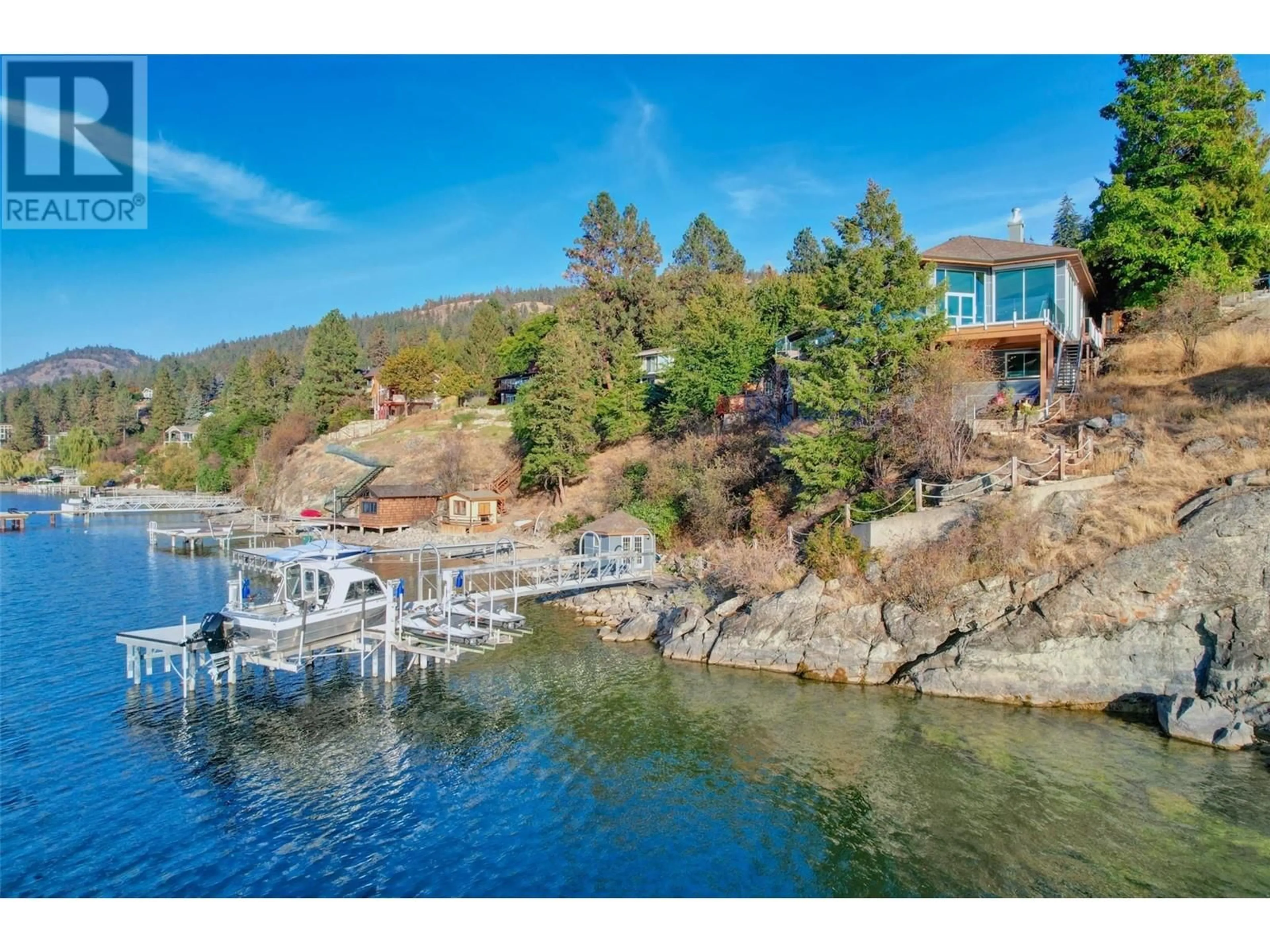 A pic from outside/outdoor area/front of a property/back of a property/a pic from drone, water/lake/river/ocean view for 2100 DEWDNEY ROAD, Kelowna British Columbia V1V2C3