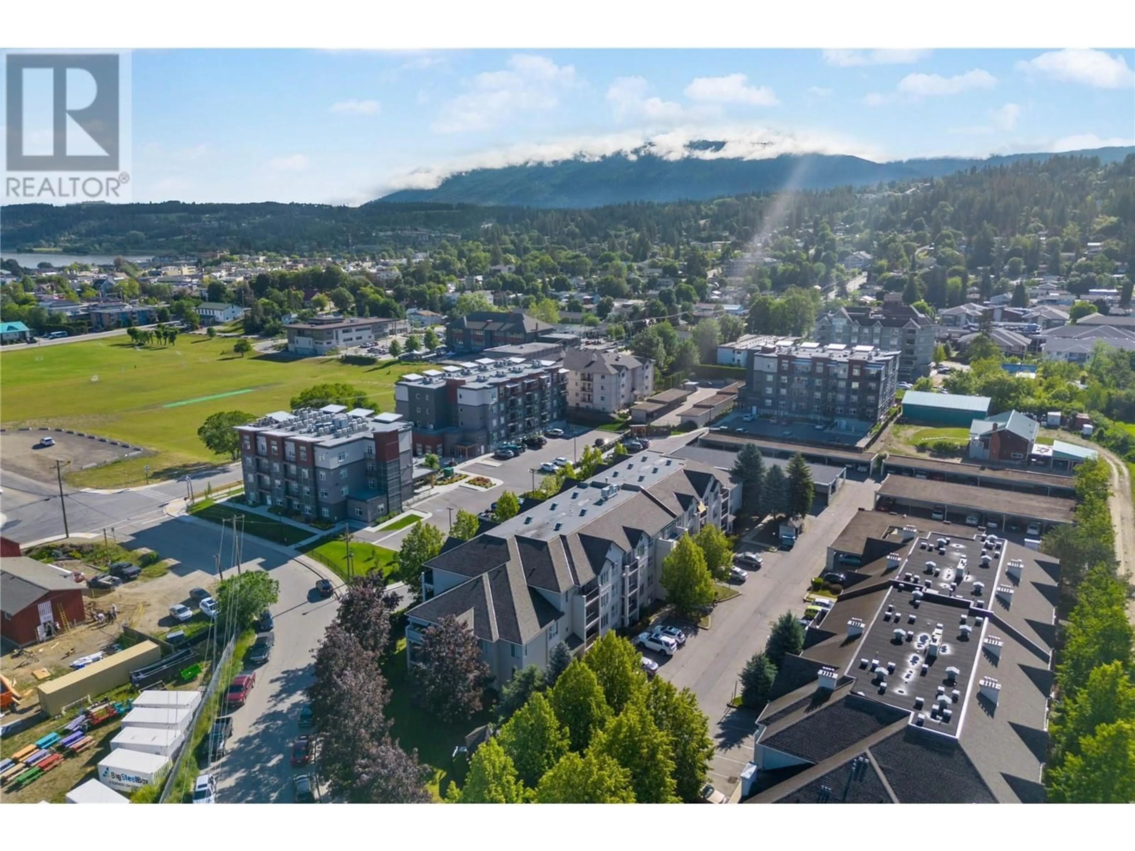 A pic from outside/outdoor area/front of a property/back of a property/a pic from drone, mountain view for 306 - 640 3 STREET SOUTHWEST, Salmon Arm British Columbia V1E2R3