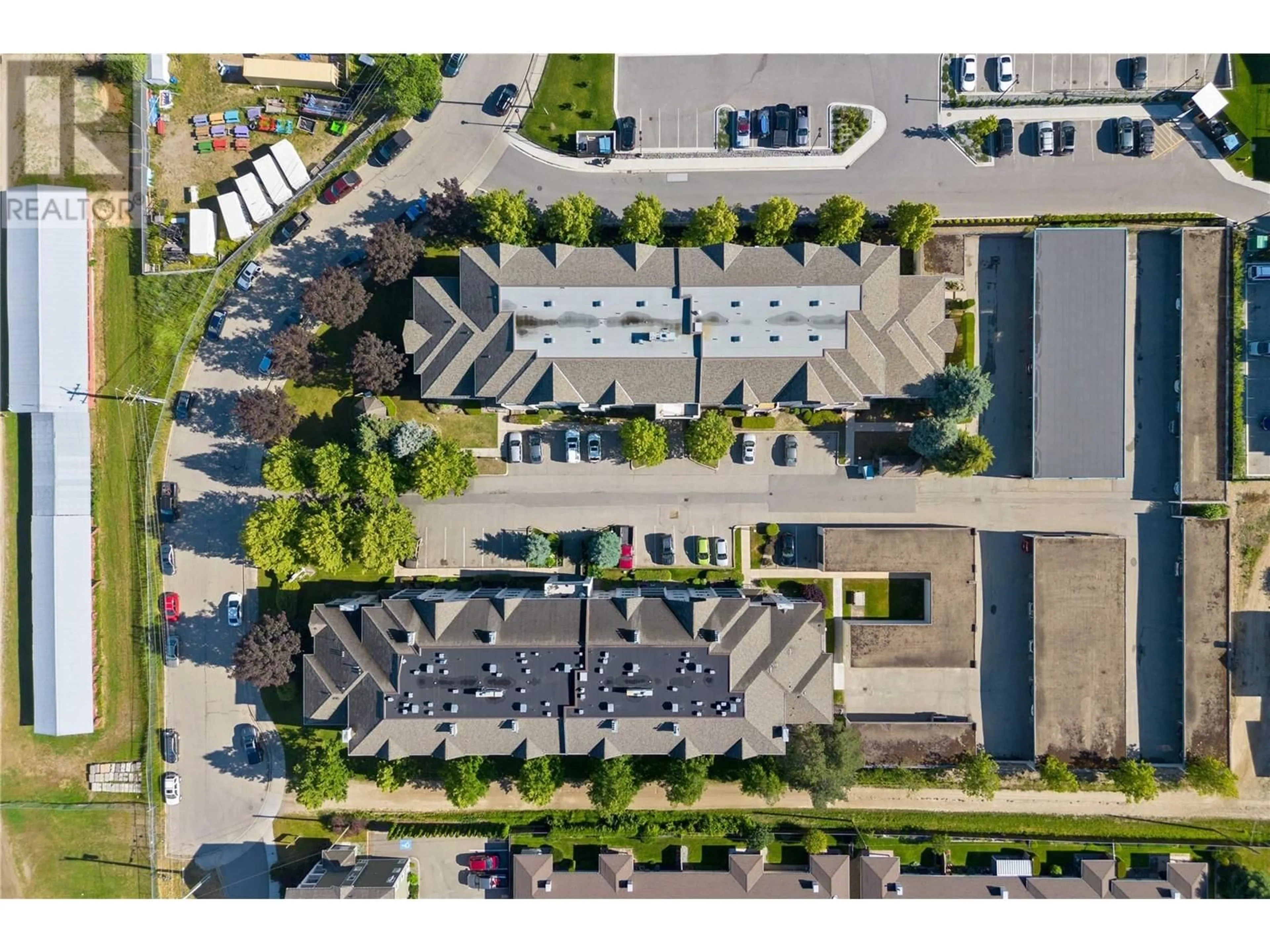 A pic from outside/outdoor area/front of a property/back of a property/a pic from drone, street for 306 - 640 3 STREET SOUTHWEST, Salmon Arm British Columbia V1E2R3