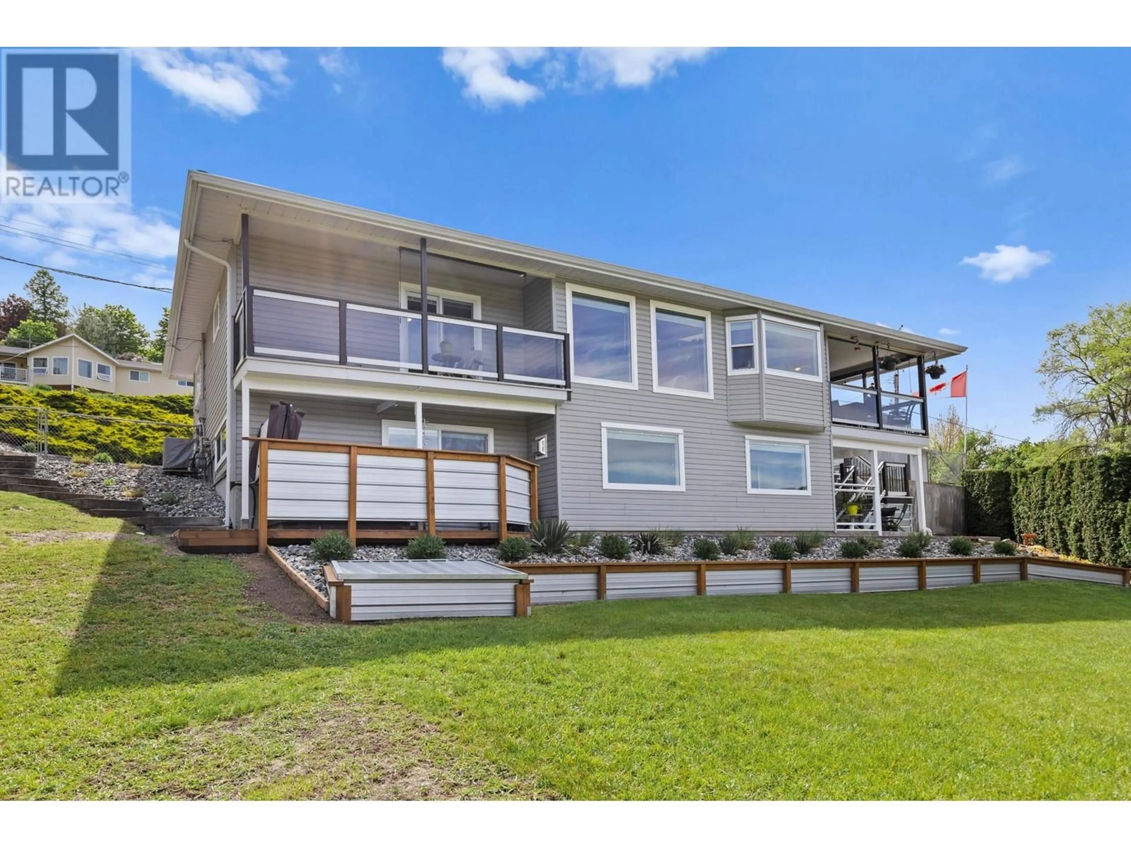 A pic from outside/outdoor area/front of a property/back of a property/a pic from drone, water/lake/river/ocean view for 11290 DAKOTA ROAD, Lake Country British Columbia V4V1X1
