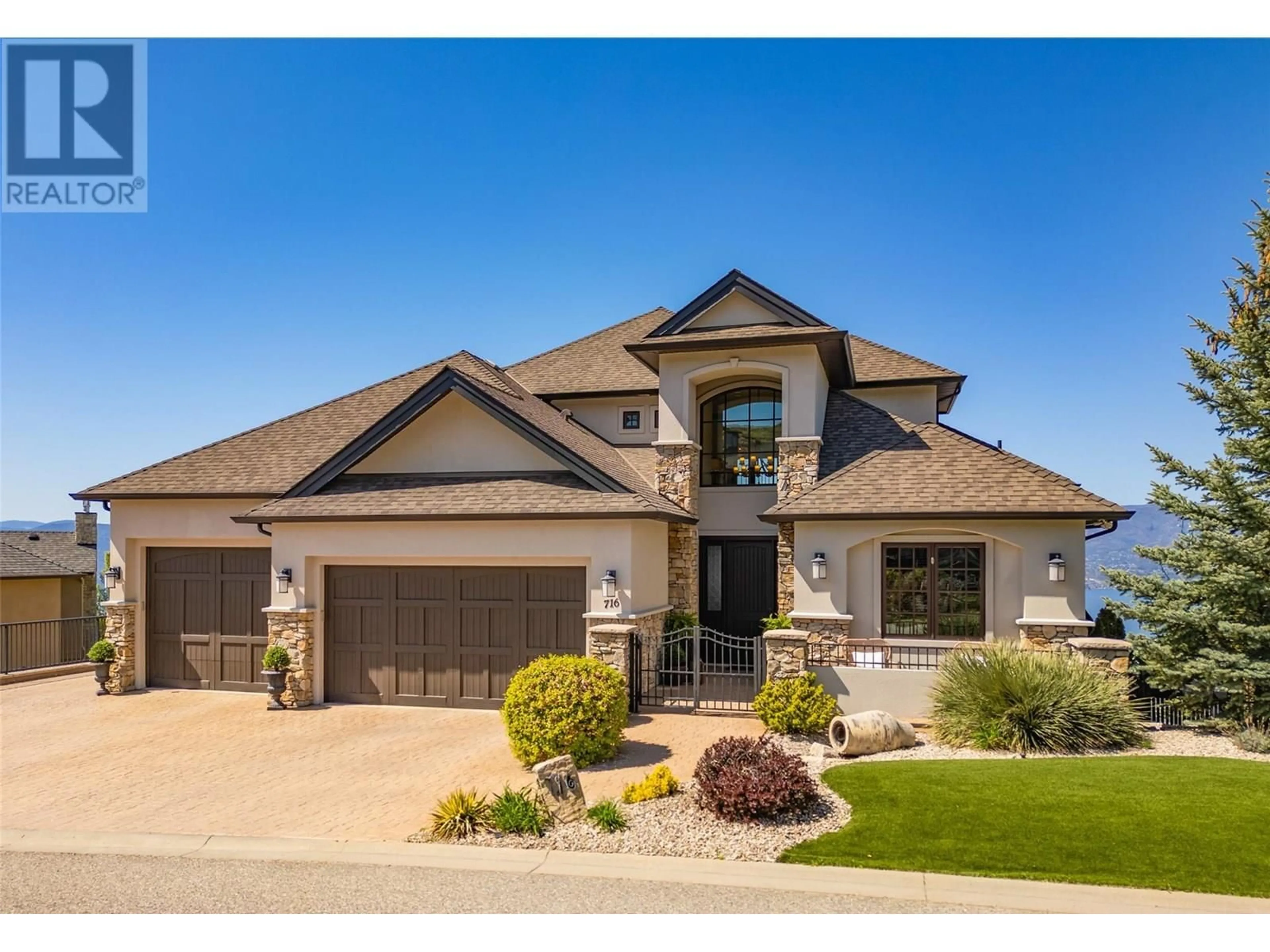 Home with brick exterior material, street for 716 KUIPERS CRESCENT, Kelowna British Columbia V1W5B2