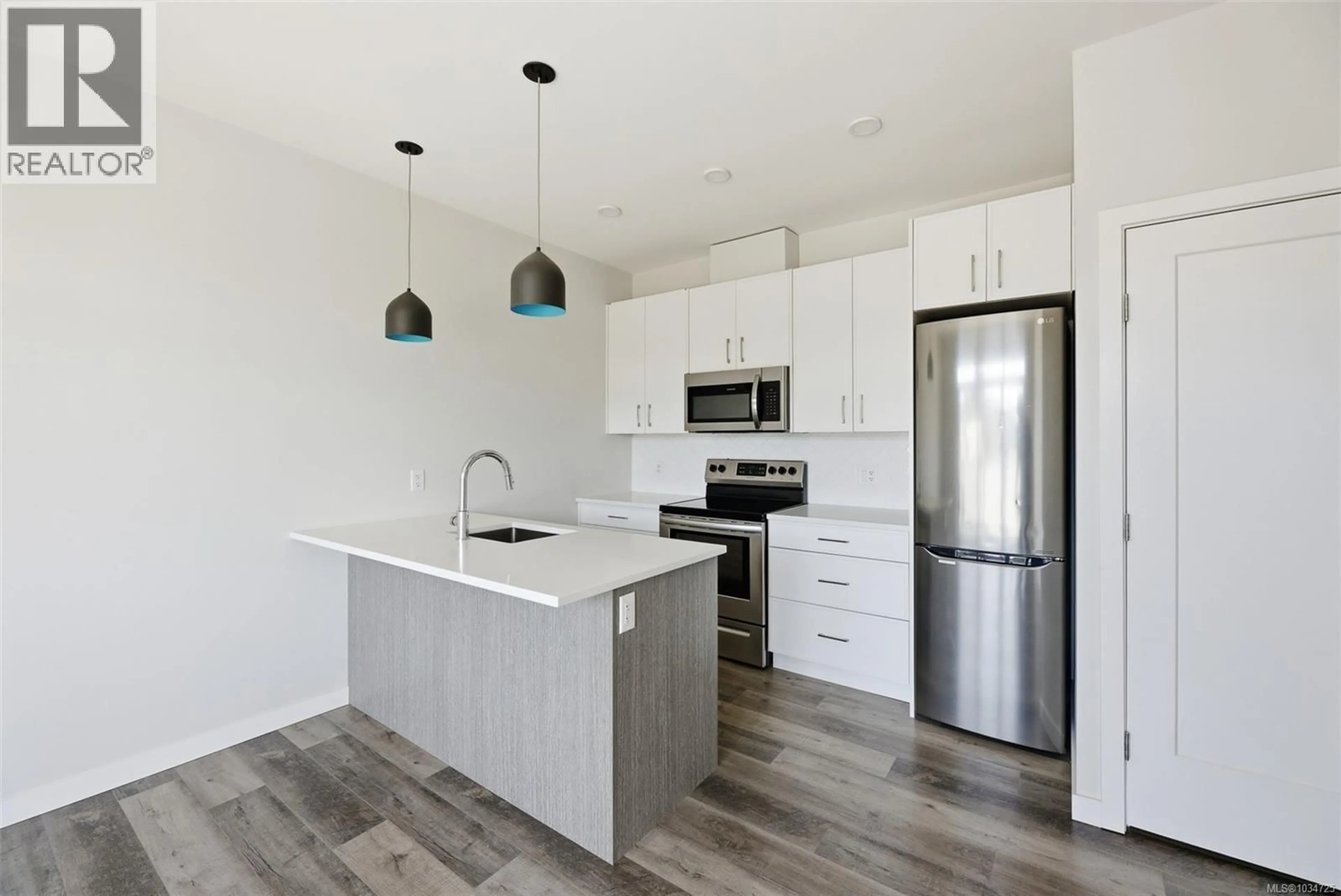 Open concept kitchen, unknown for 303 - 1515 REDFERN STREET, Victoria British Columbia V8R4X3