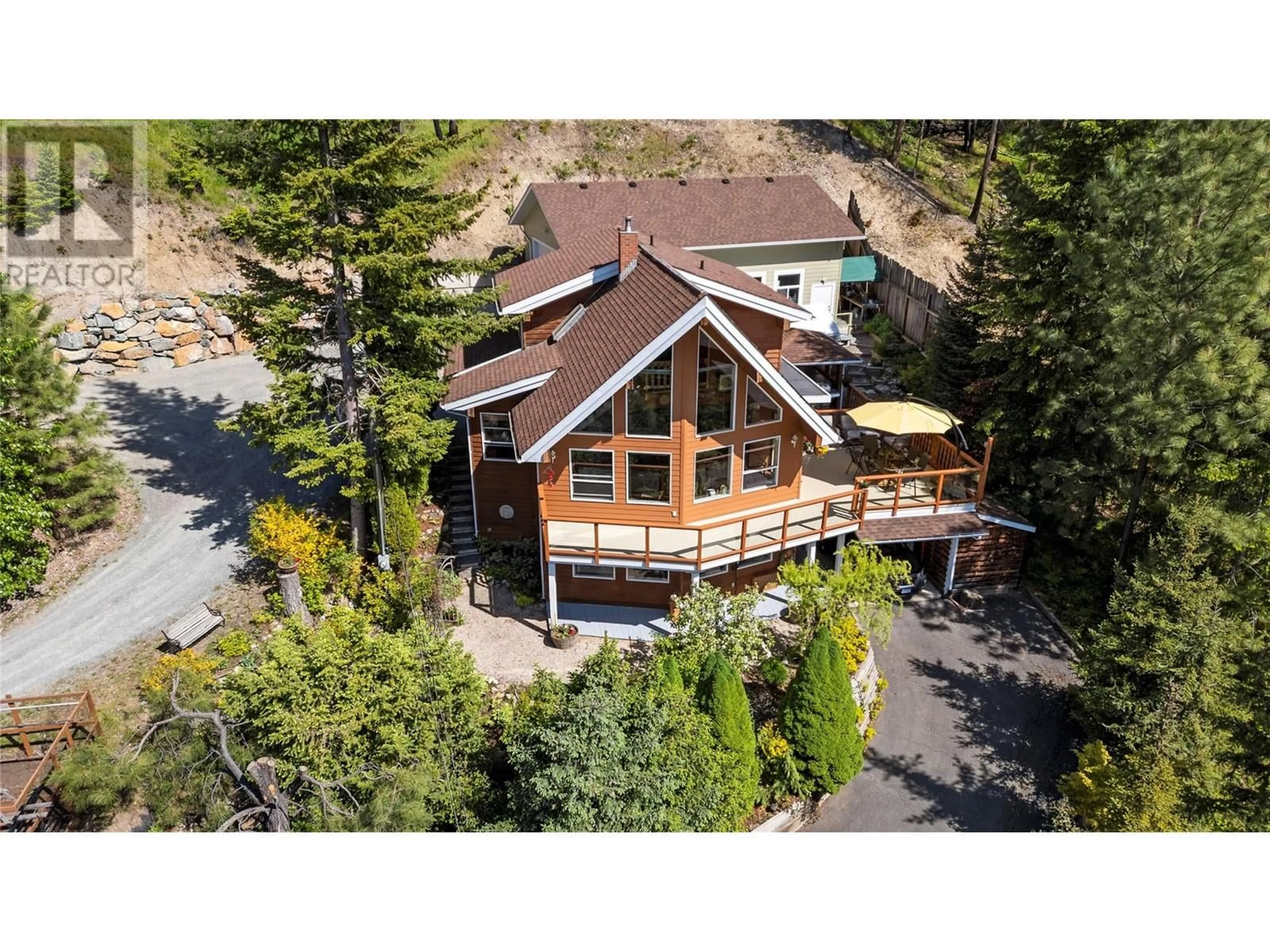 A pic from outside/outdoor area/front of a property/back of a property/a pic from drone, unknown for 5261 HLINA ROAD, Celista British Columbia V0E1M6