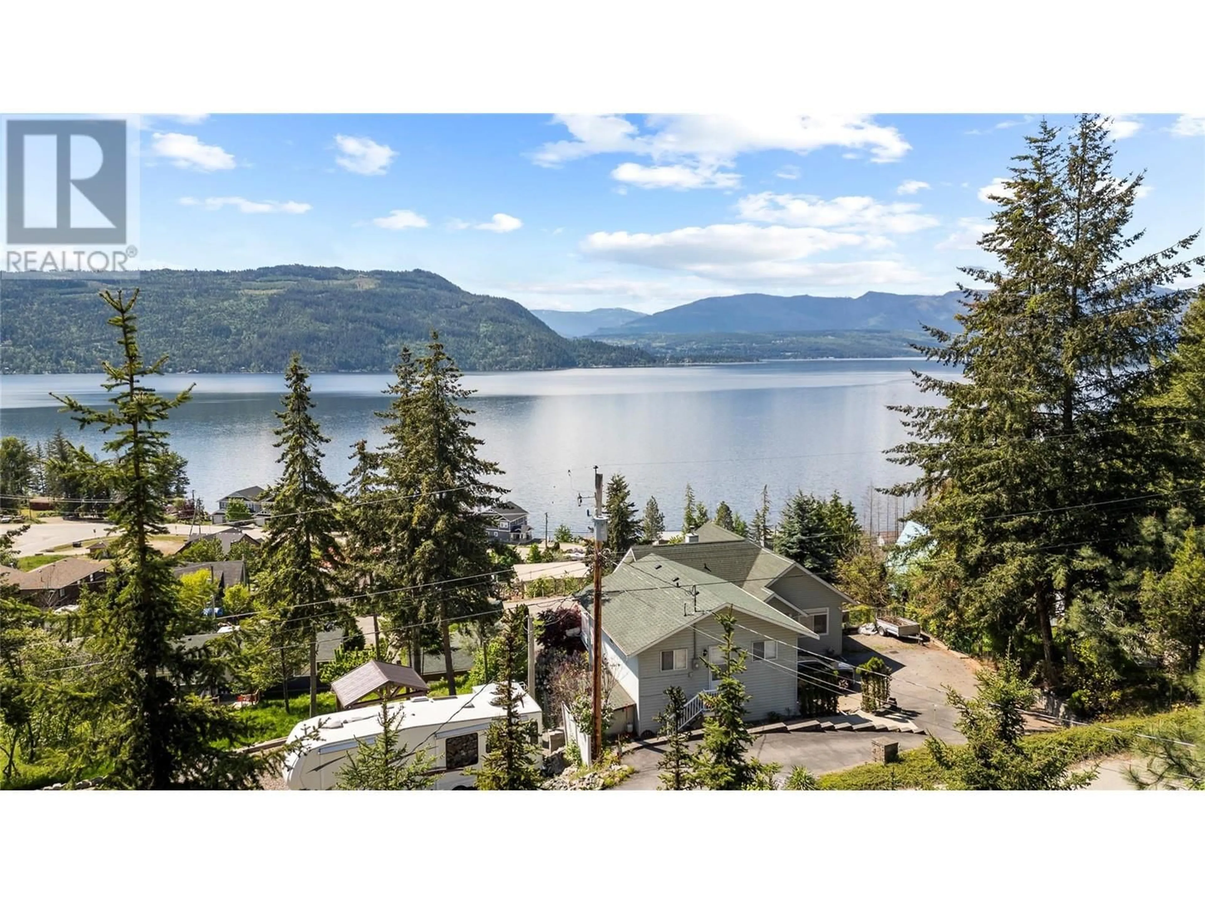 A pic from outside/outdoor area/front of a property/back of a property/a pic from drone, water/lake/river/ocean view for 5261 HLINA ROAD, Celista British Columbia V0E1M6