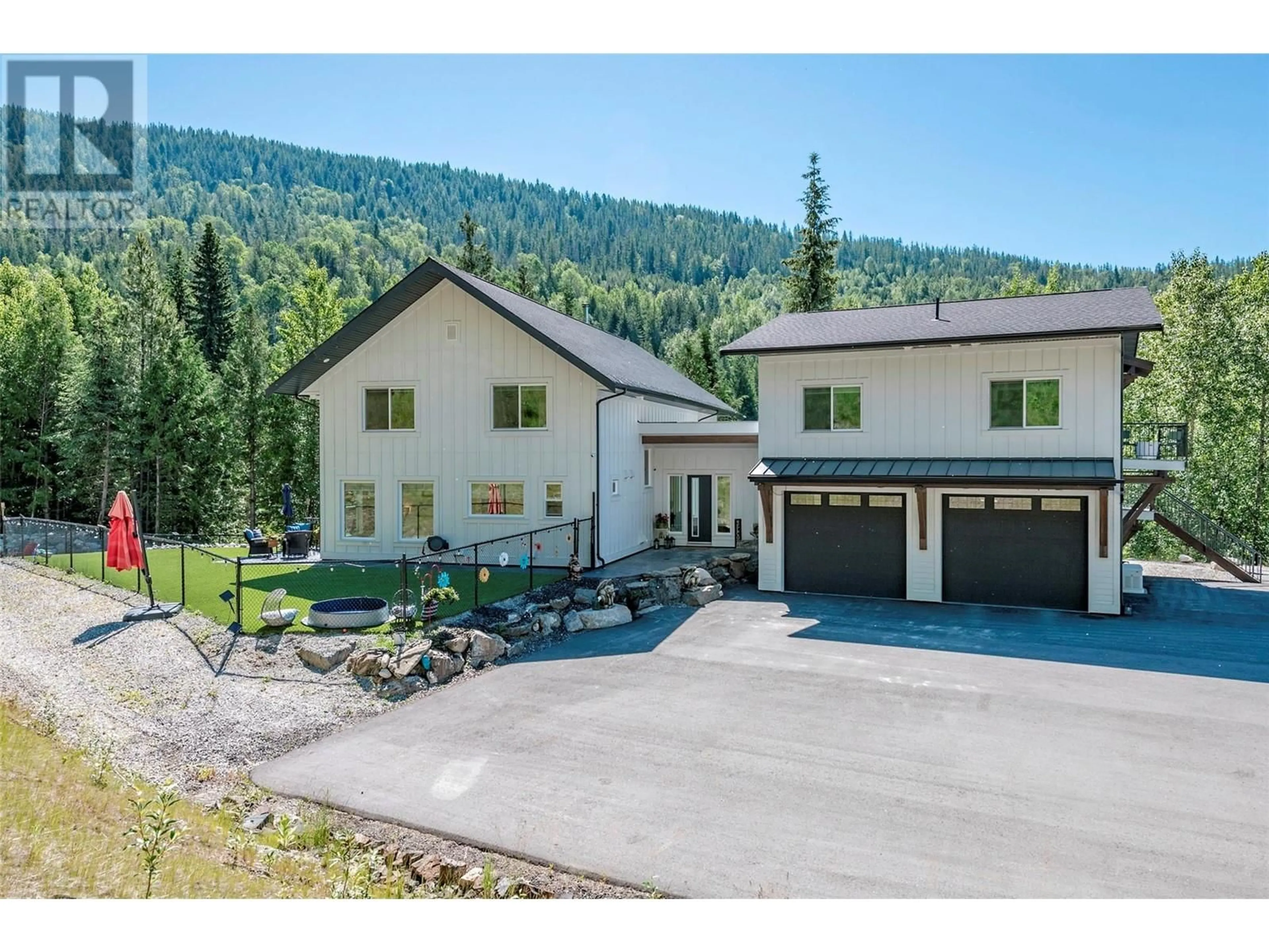 A pic from outside/outdoor area/front of a property/back of a property/a pic from drone, mountain view for 8735 FORSBERG ROAD, Vernon British Columbia V1B3M6
