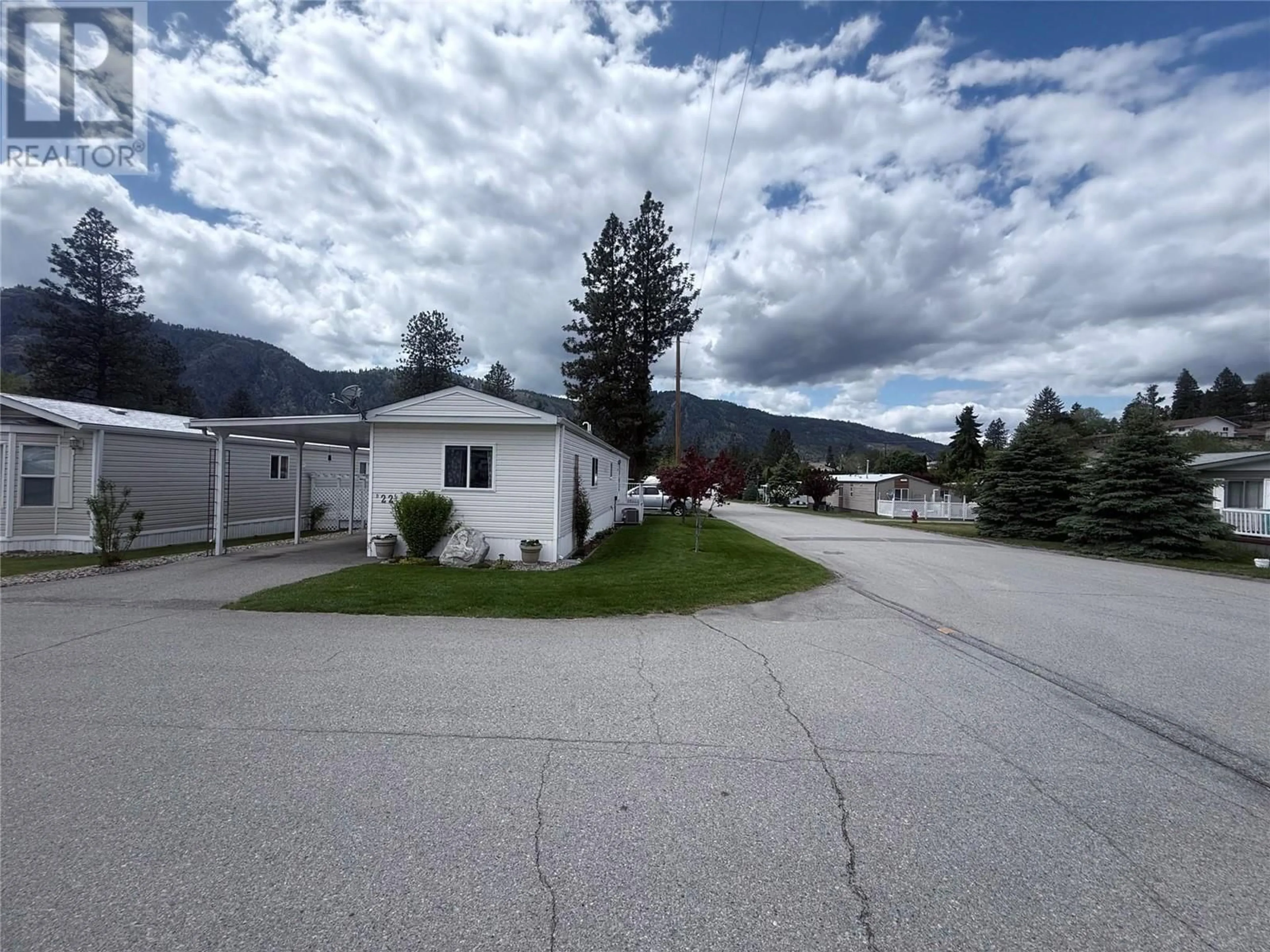 A pic from outside/outdoor area/front of a property/back of a property/a pic from drone, mountain view for D22 - 4505 MCLEAN CREEK ROAD, Okanagan Falls British Columbia V0H1R0
