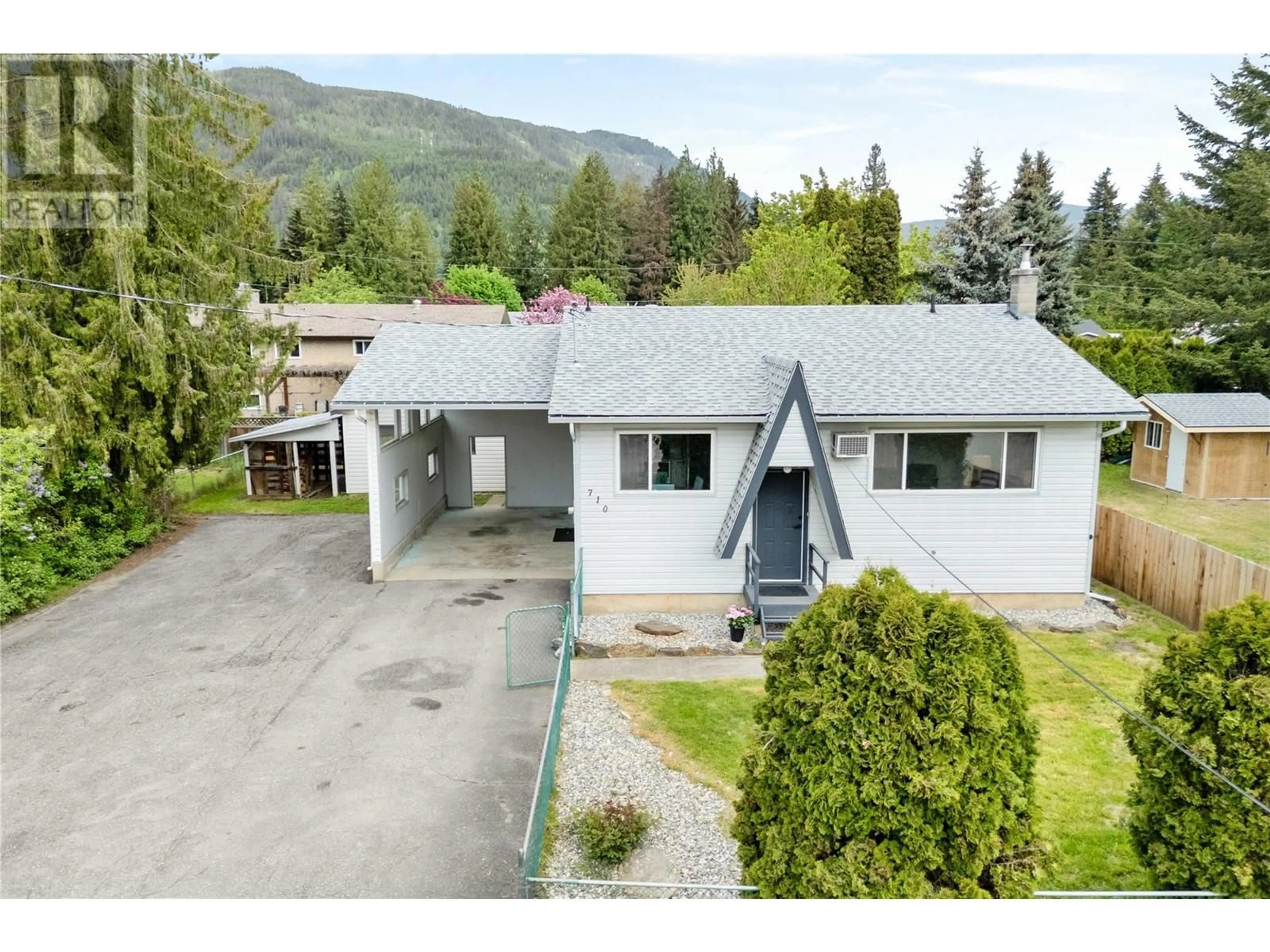 A pic from outside/outdoor area/front of a property/back of a property/a pic from drone, mountain view for 710 CONN STREET, Sicamous British Columbia V0E2B0