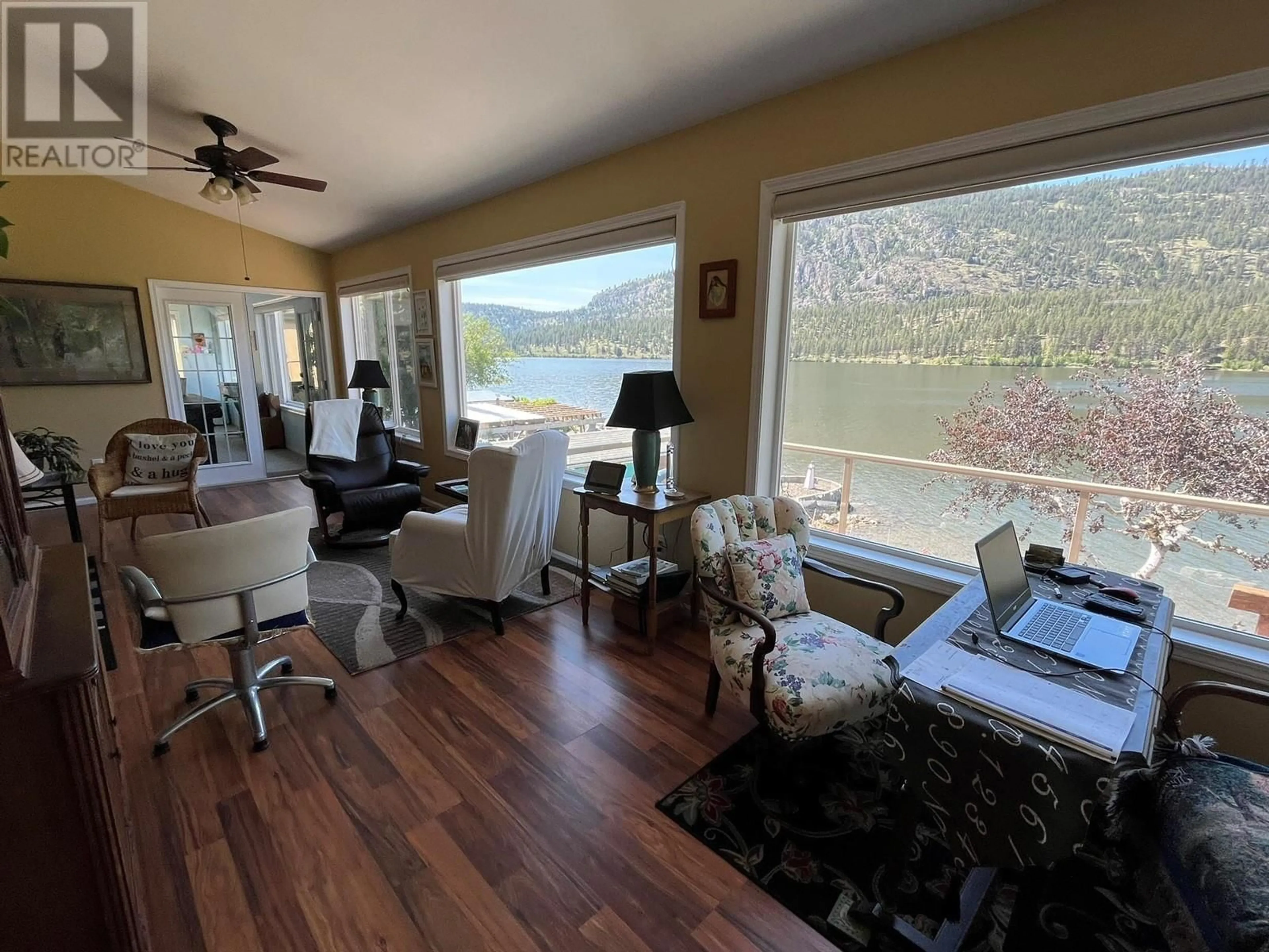 Living room with furniture, wood/laminate floor for 3160 VASEUX LAKE, Okanagan Falls British Columbia V0H1R2