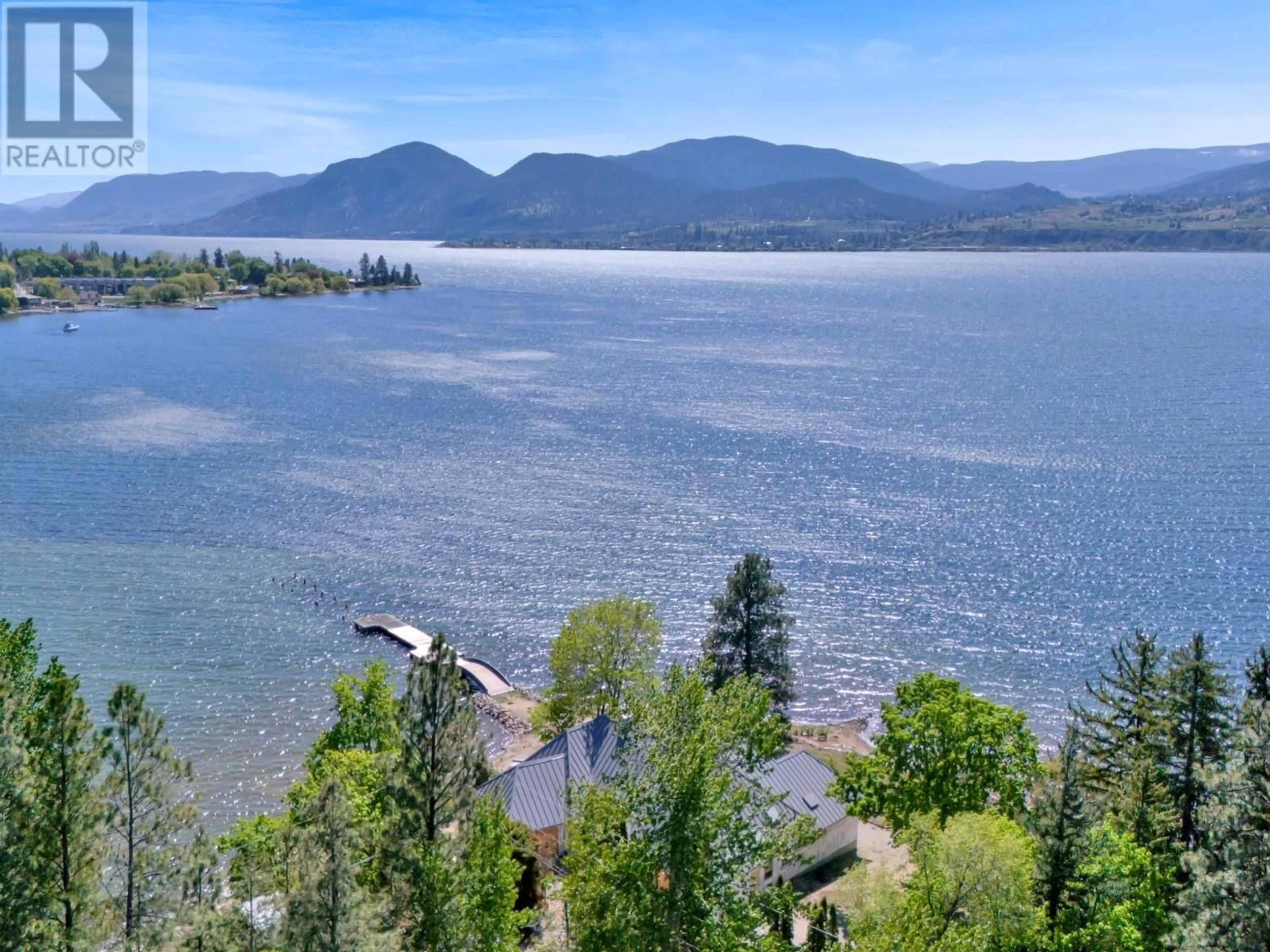 A pic from outside/outdoor area/front of a property/back of a property/a pic from drone, water/lake/river/ocean view for 4575 MILL ROAD, Naramata British Columbia V0H1N0