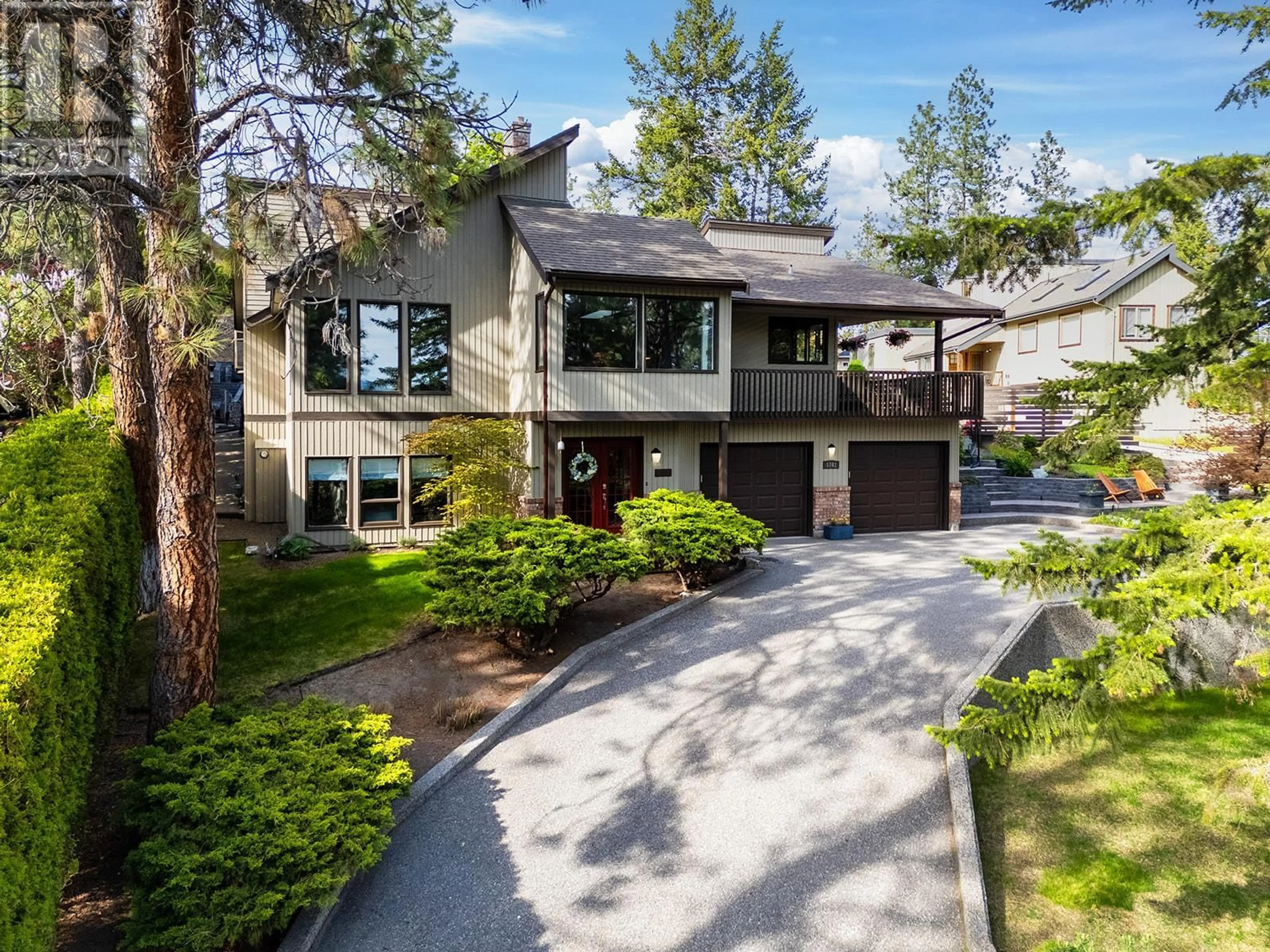 Home with vinyl exterior material, street for 1741 KELOKA DRIVE, West Kelowna British Columbia V1Z2Y3