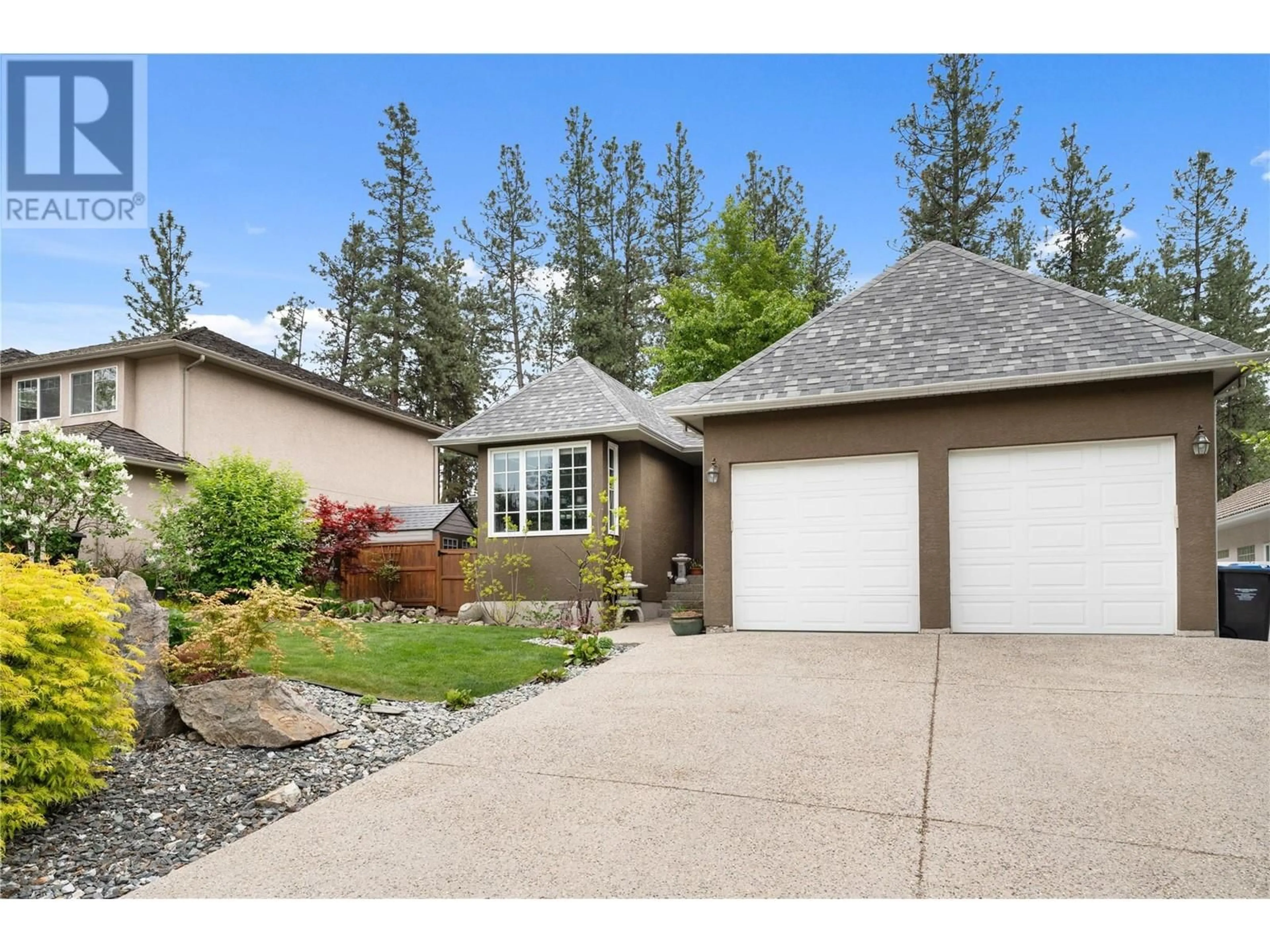 Home with vinyl exterior material, street for 2993 QUAIL CRESCENT, Kelowna British Columbia V1V1Z8