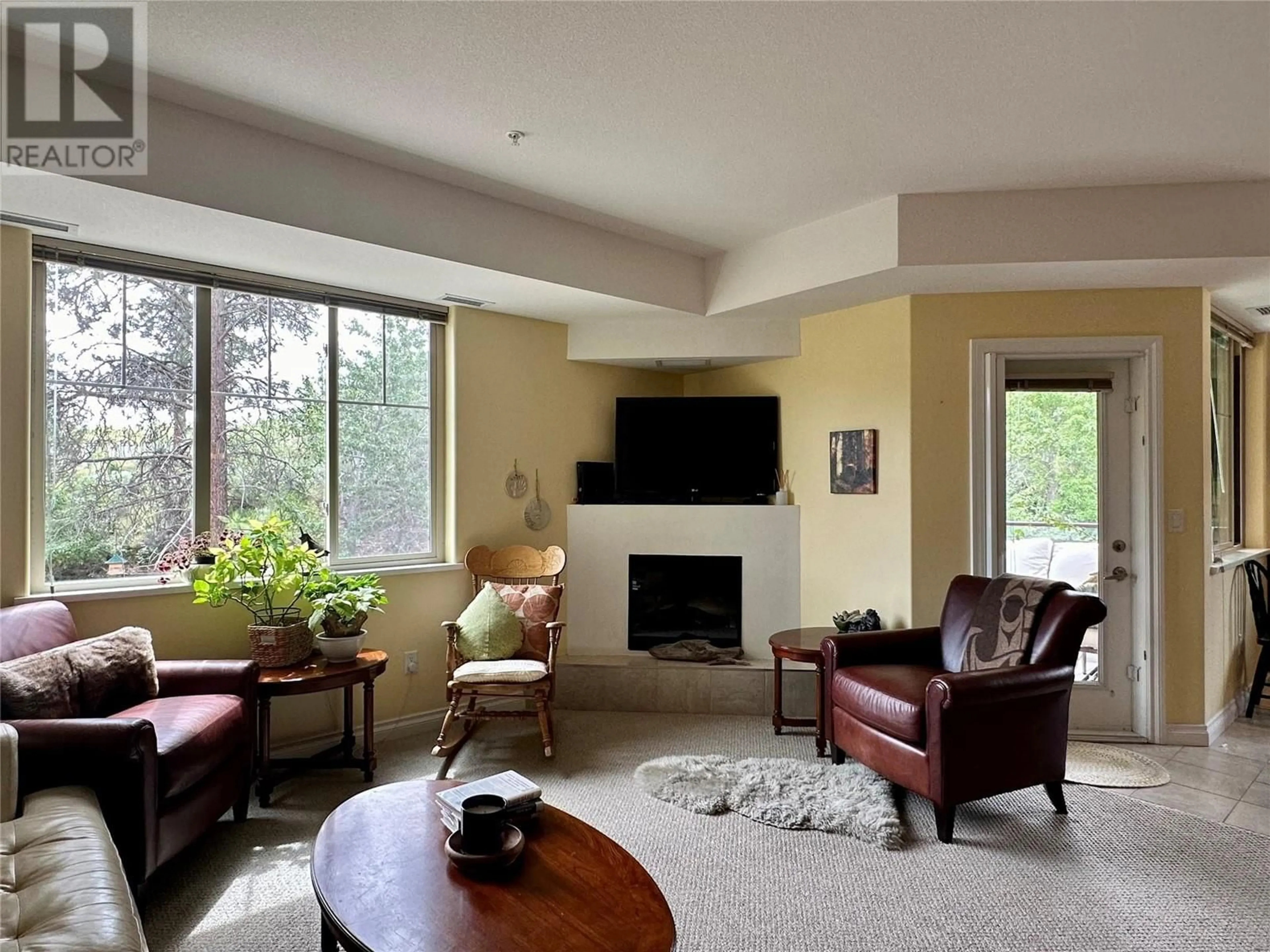 Living room with furniture, unknown for 302C - 921 SPILLWAY ROAD, Oliver British Columbia V0H1T8