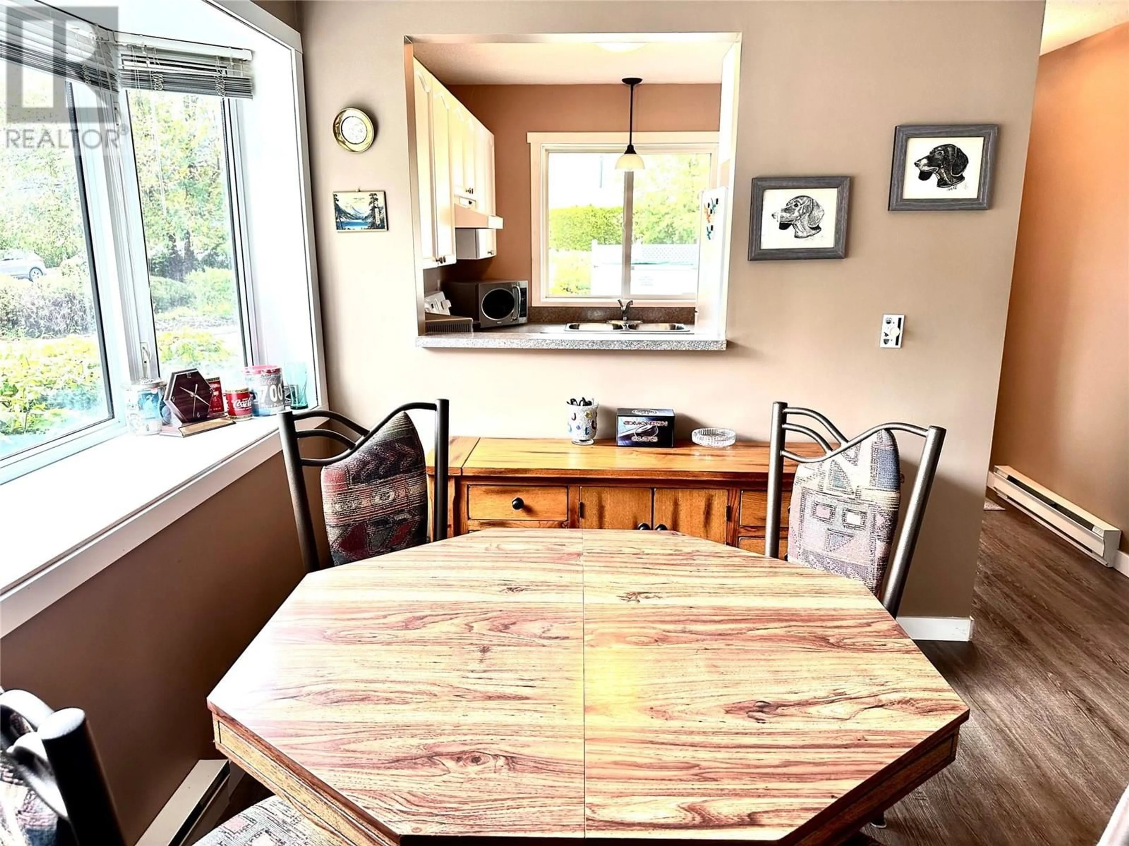 Dining room, wood/laminate floor for 1 - 751 LANFRANCO ROAD, Kelowna British Columbia V1W3B9