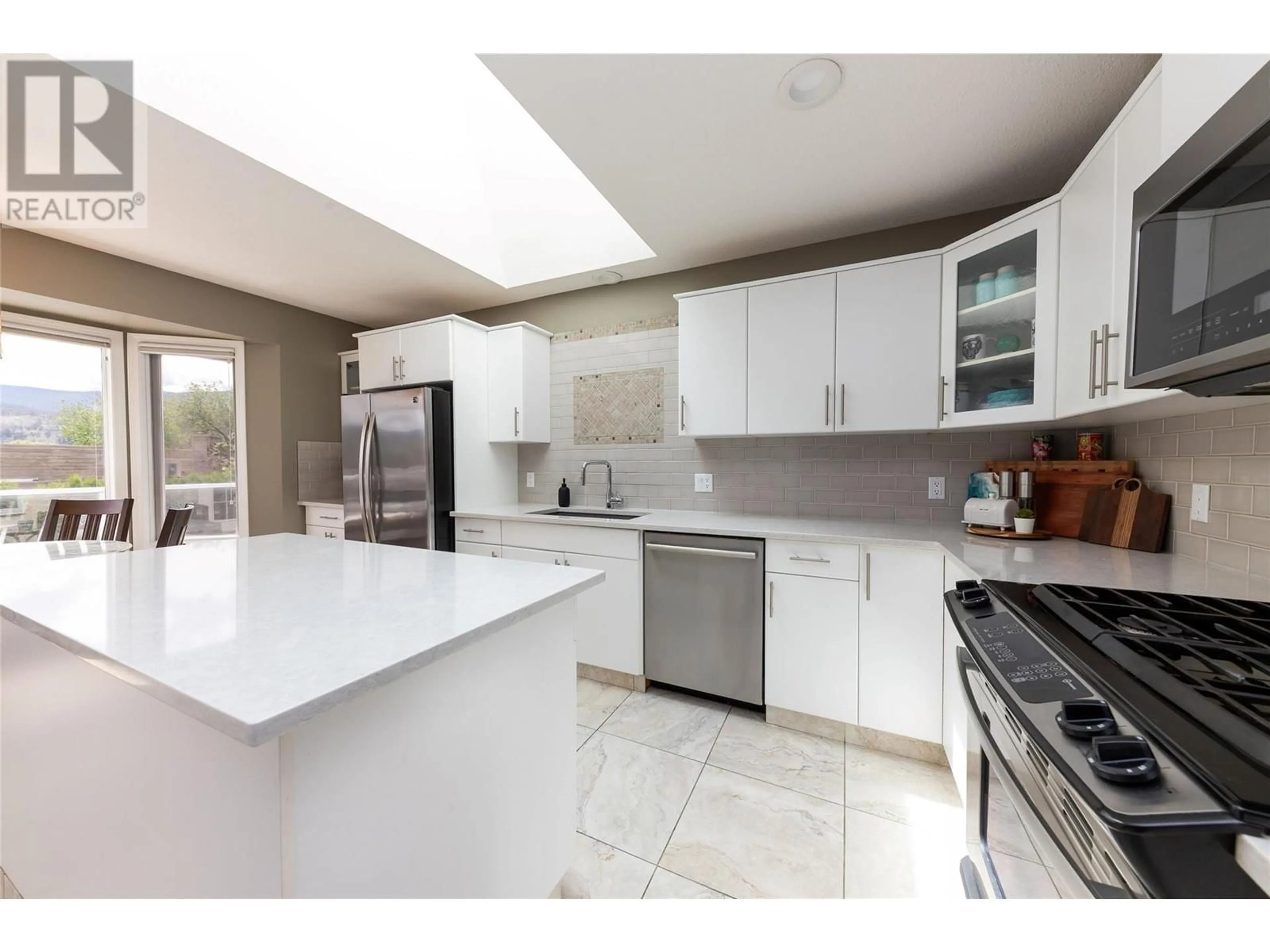 Open concept kitchen, ceramic/tile floor for 3492 NAVATANEE DRIVE, Kamloops British Columbia V2H1S1