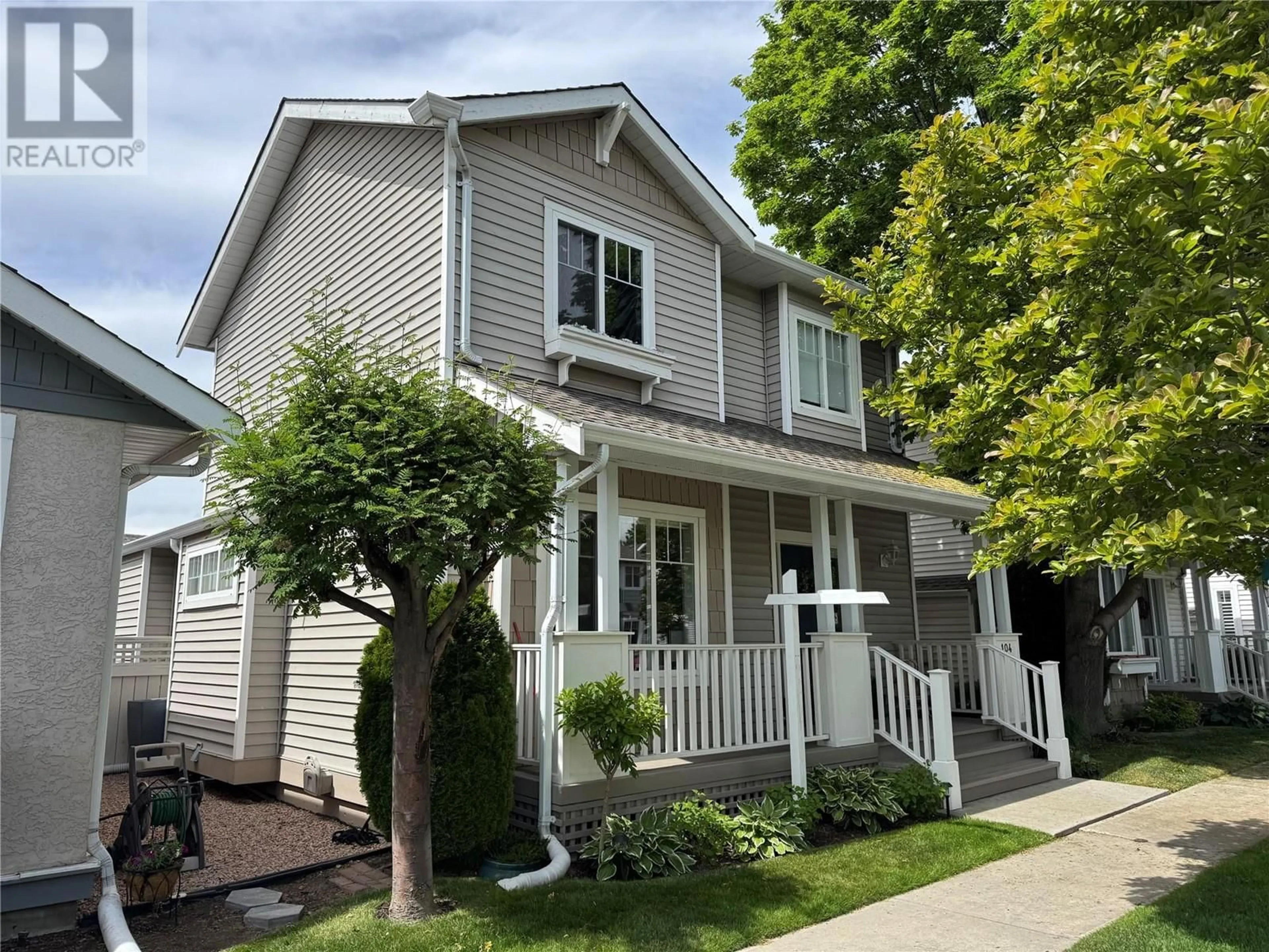 Home with vinyl exterior material, street for 104 - 665 COOK ROAD, Kelowna British Columbia V1W4T4