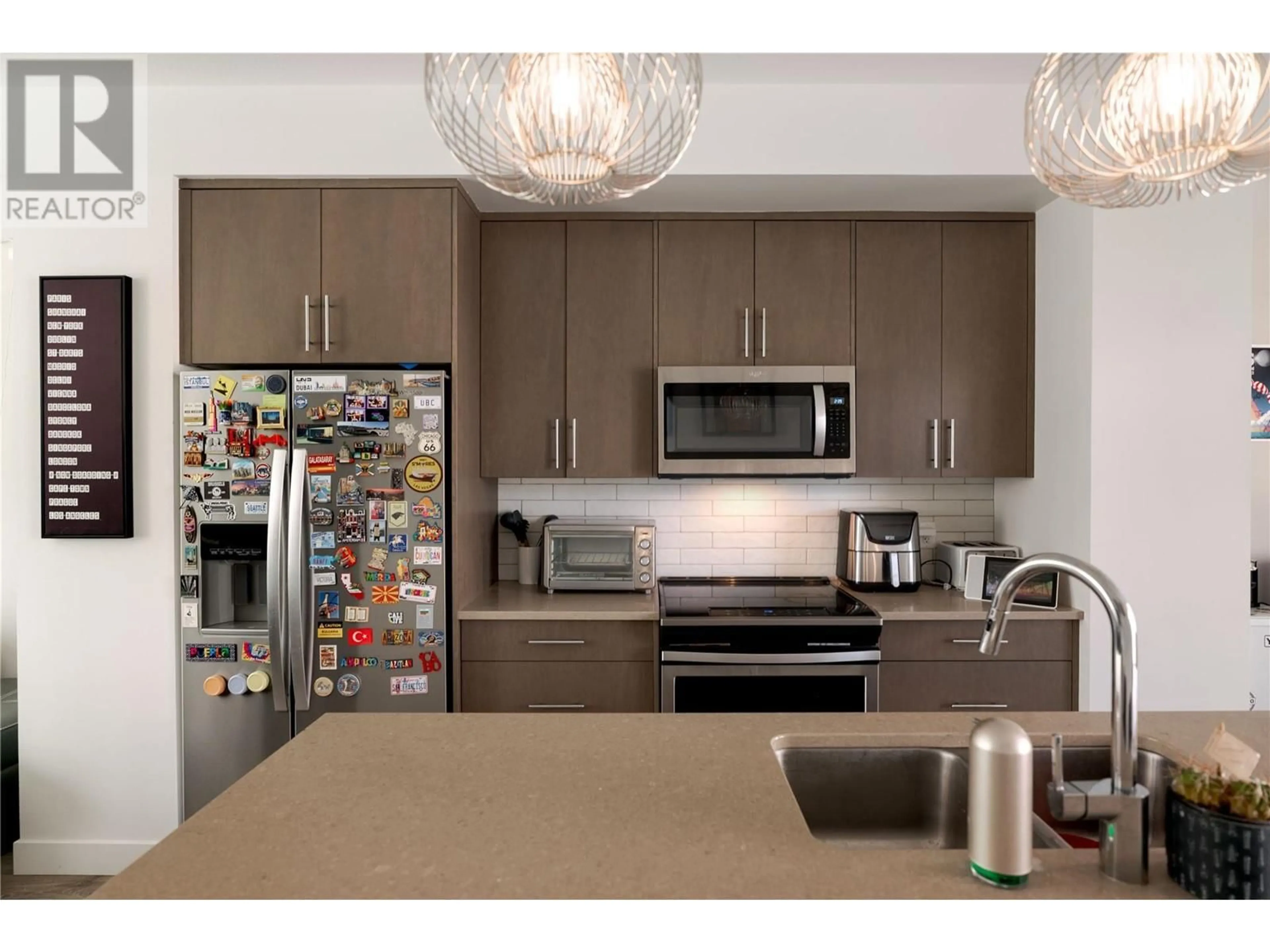 Contemporary kitchen, unknown for 7 - 610 ACADEMY WAY, Kelowna British Columbia V1V0E8
