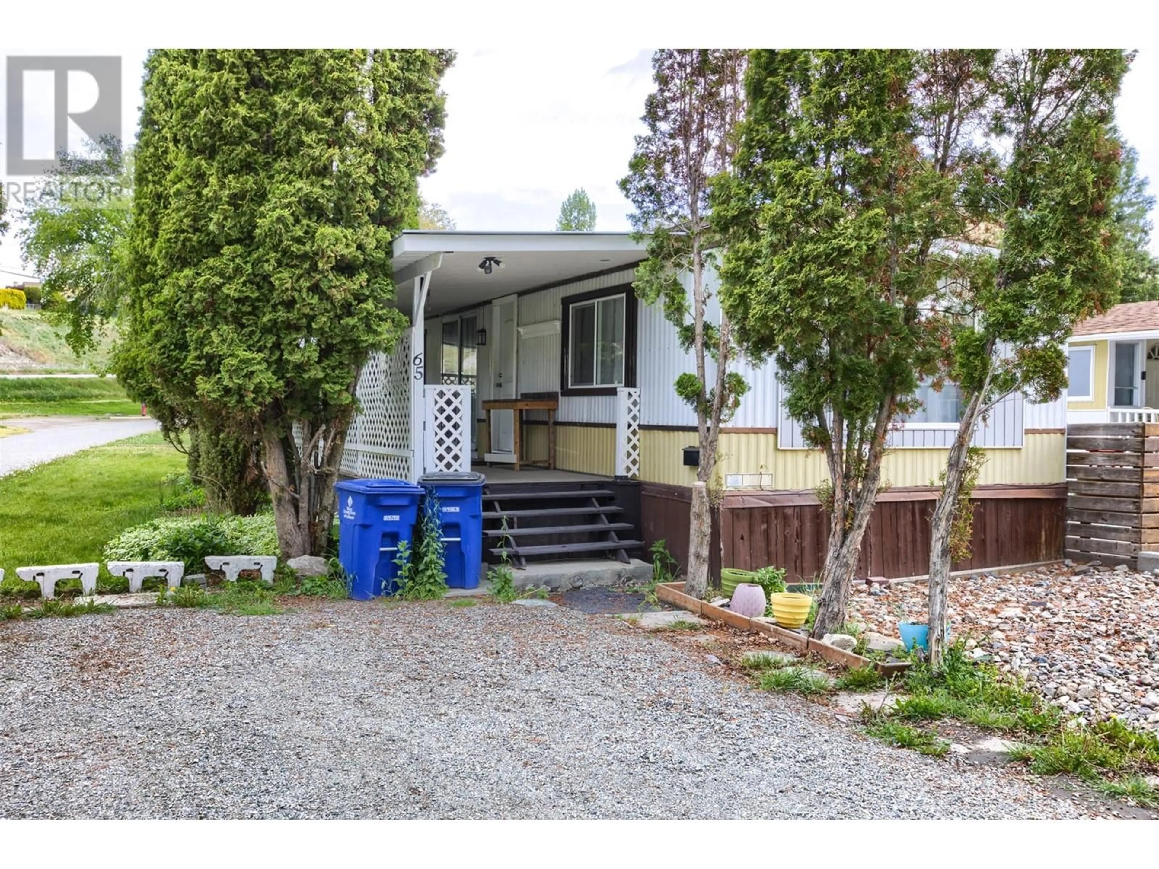 Home with vinyl exterior material, street for 65 - 2065 BOUCHERIE ROAD, West Kelowna British Columbia V4T2A8