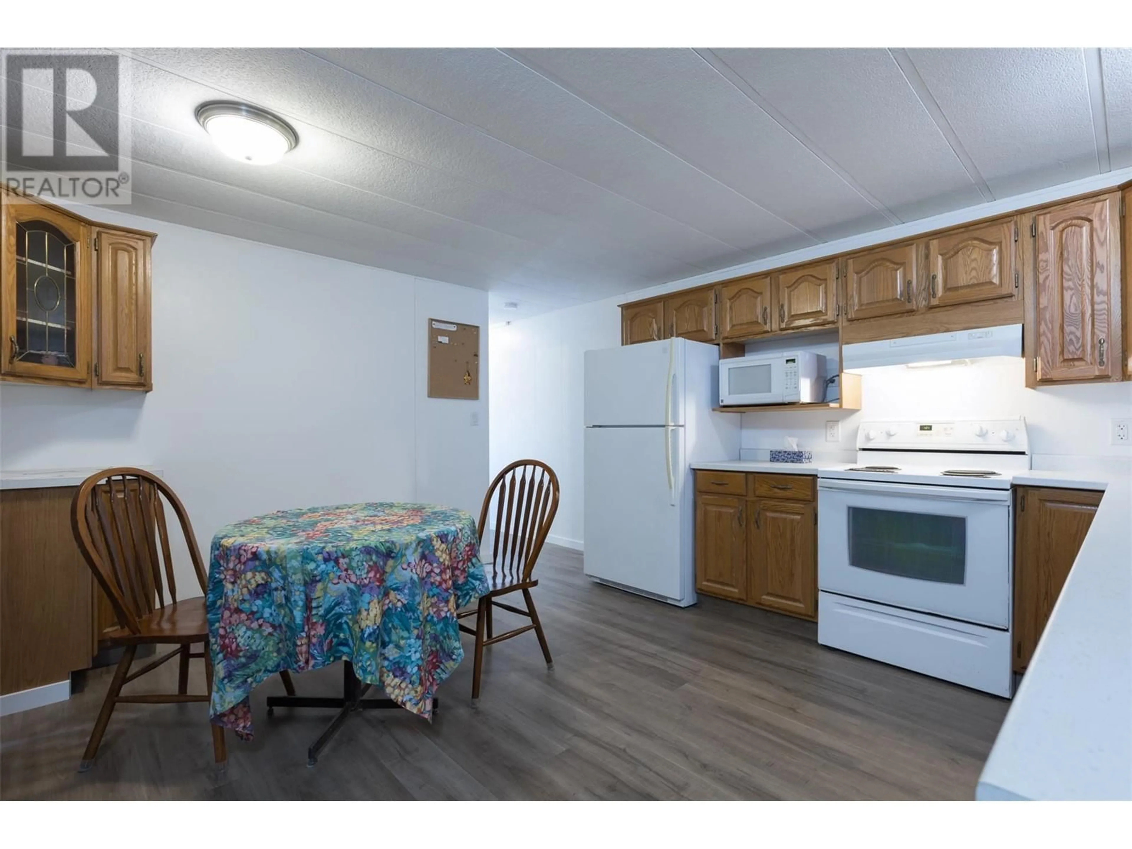 Standard kitchen, wood/laminate floor for 65 - 2065 BOUCHERIE ROAD, West Kelowna British Columbia V4T2A8