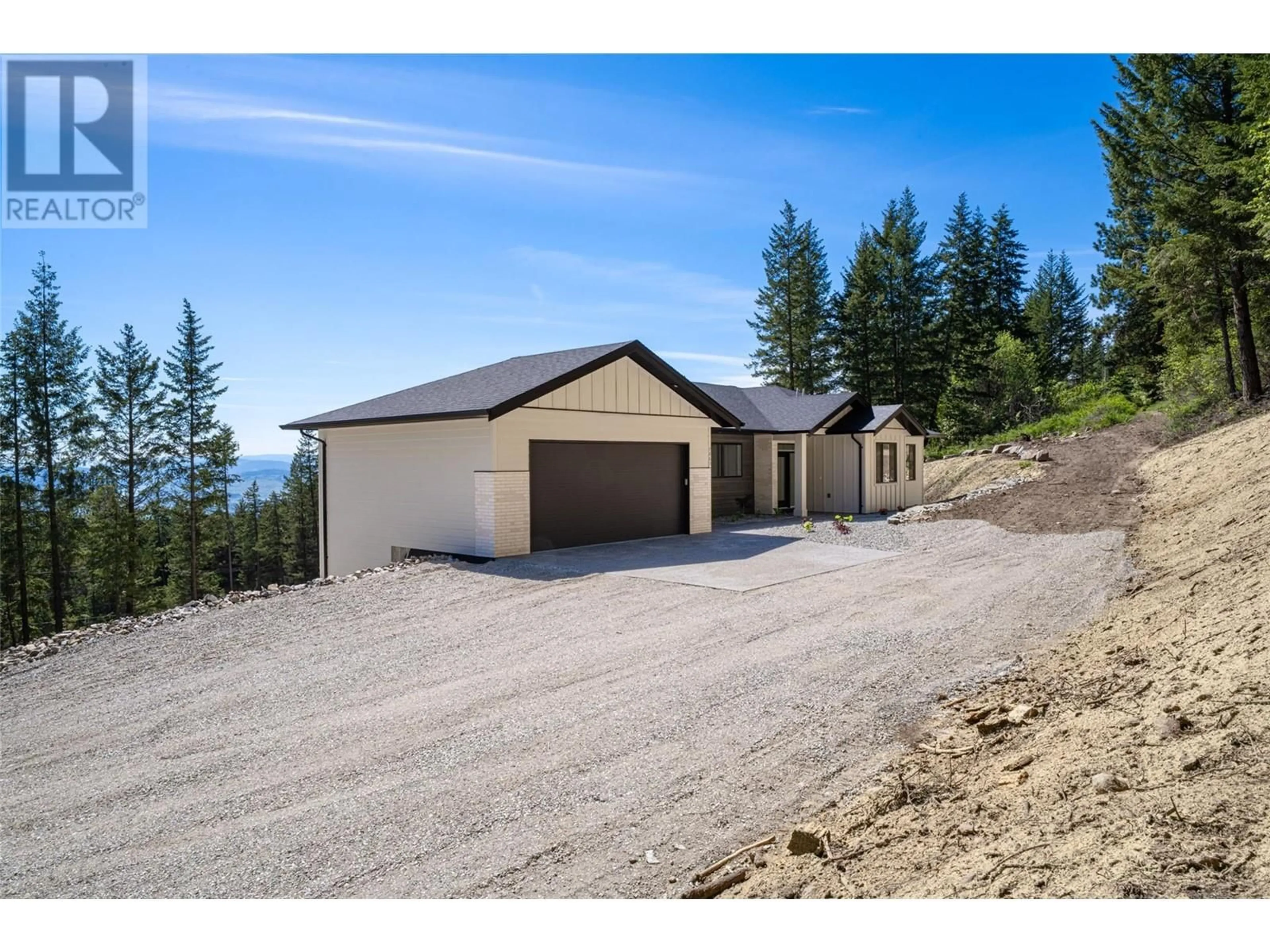 A pic from outside/outdoor area/front of a property/back of a property/a pic from drone, mountain view for 7863 BOULTER ROAD, Vernon British Columbia V1B3N2
