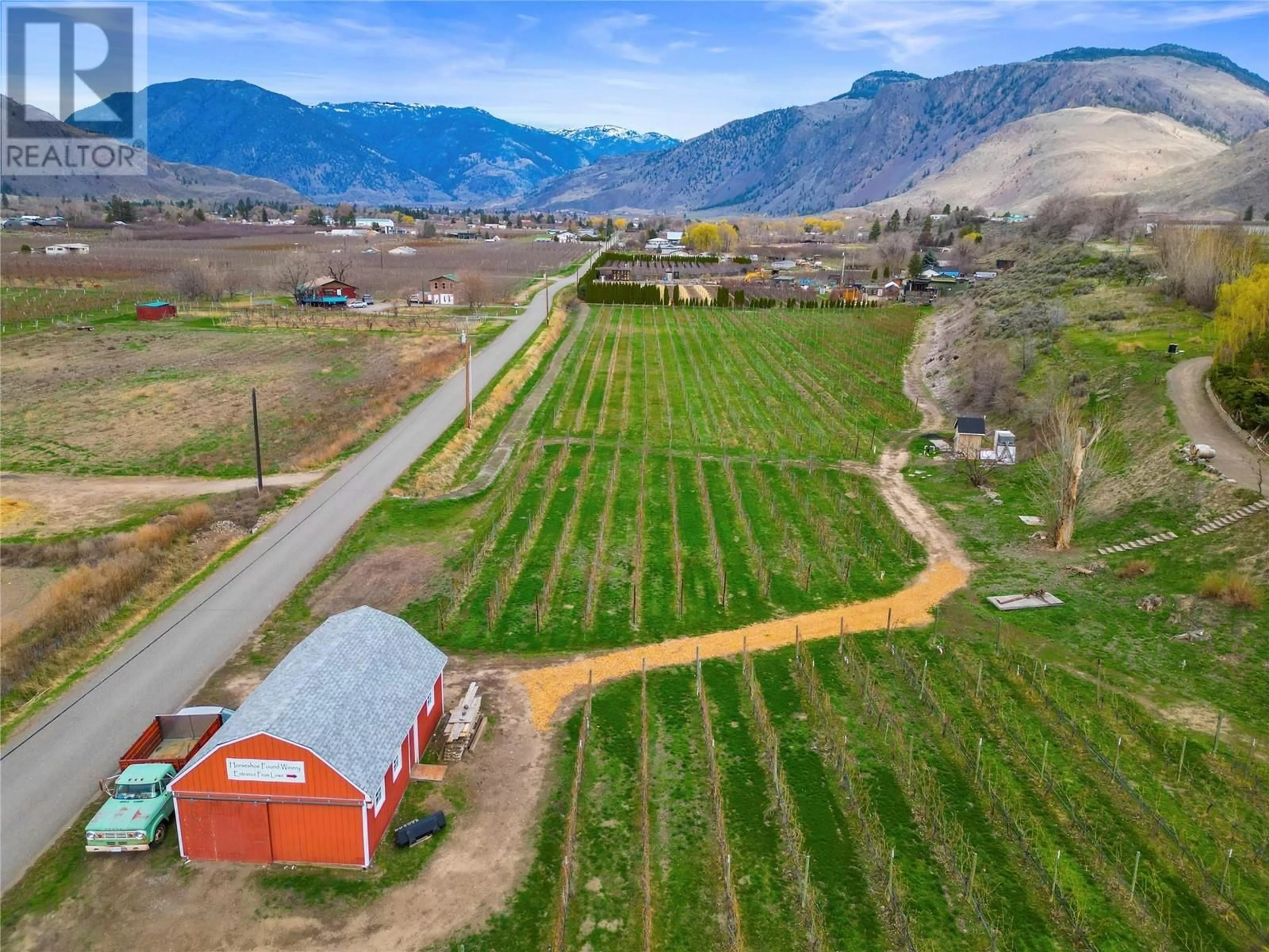A pic from outside/outdoor area/front of a property/back of a property/a pic from drone, mountain view for 715 LOWE DRIVE, Cawston British Columbia V0X1C2