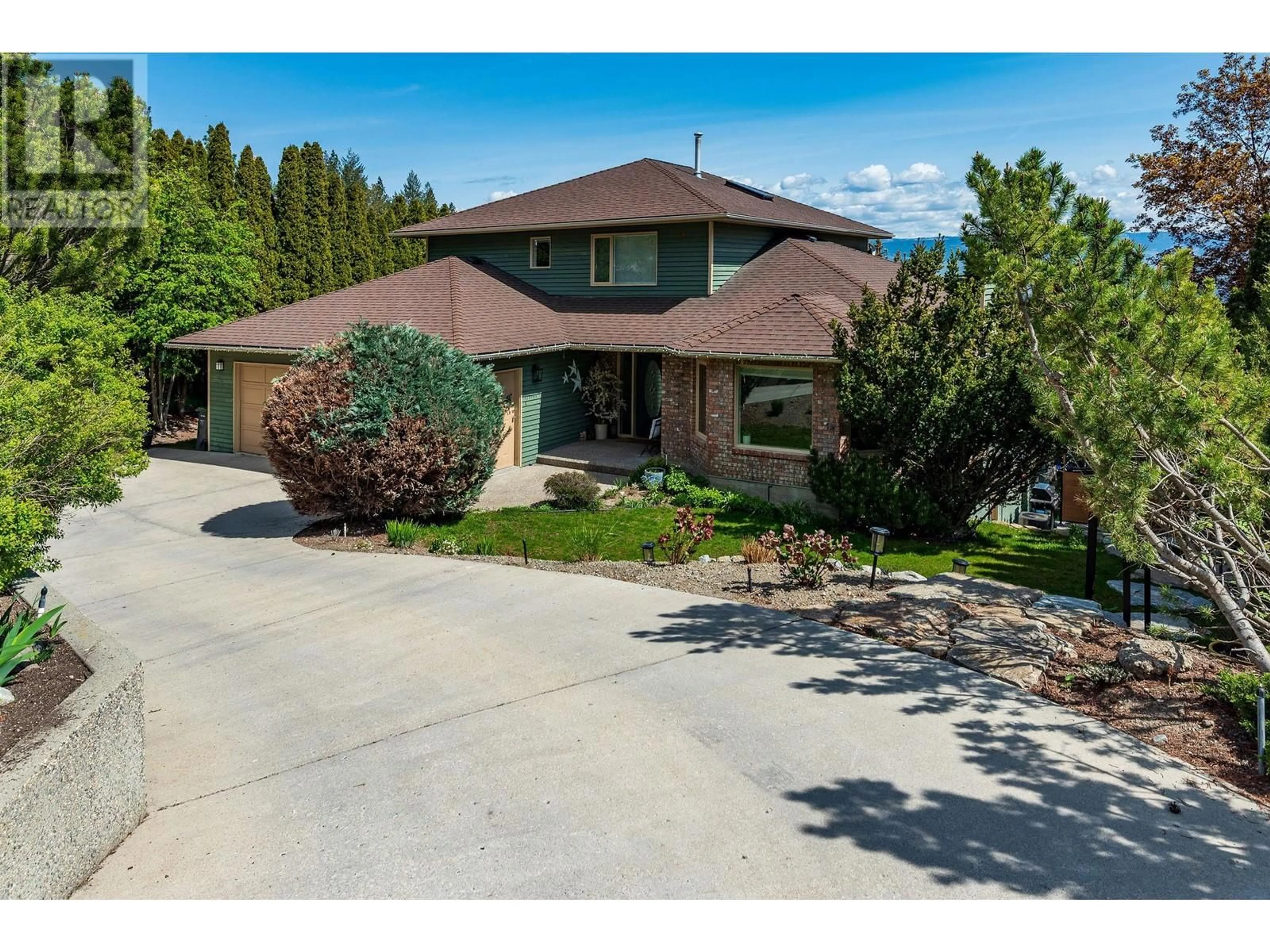 A pic from outside/outdoor area/front of a property/back of a property/a pic from drone, street for 1575 WEST KELOWNA ROAD, West Kelowna British Columbia V1Z3H5