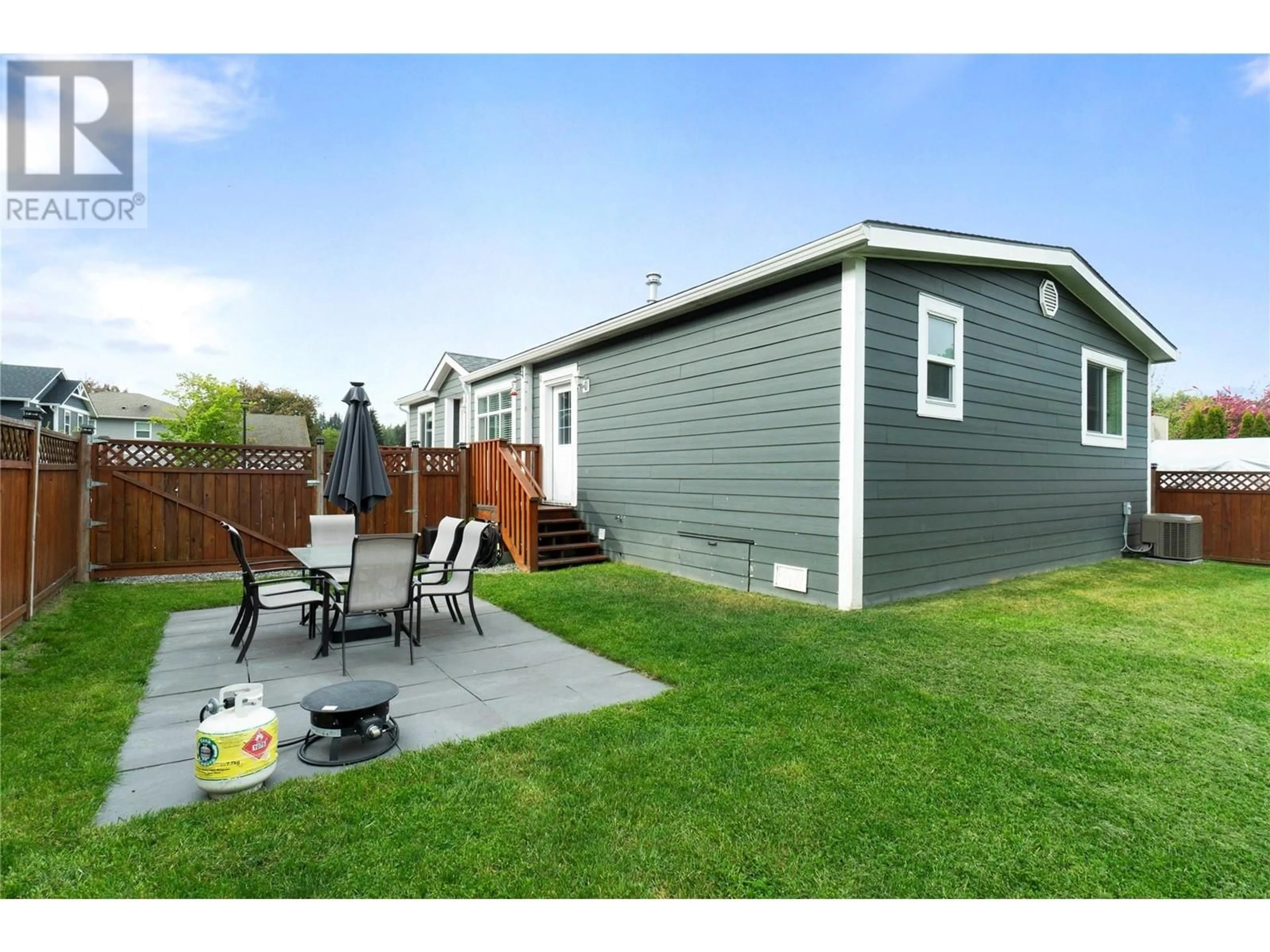 Home with vinyl exterior material, street for 5441 73 AVENUE NORTHEAST, Salmon Arm British Columbia V1E1K0