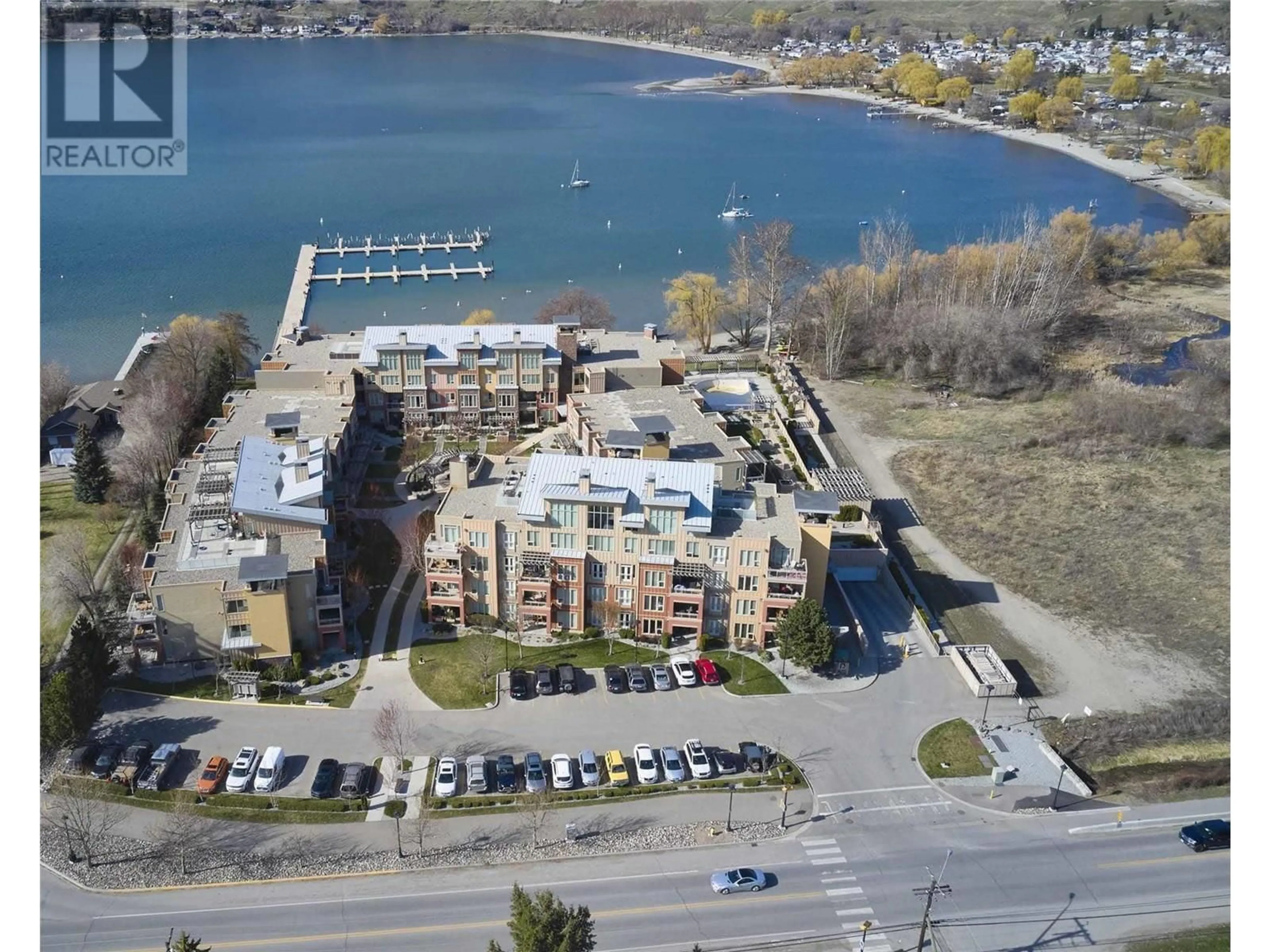 A pic from outside/outdoor area/front of a property/back of a property/a pic from drone, water/lake/river/ocean view for 1110 - 7343 OKANAGAN LANDING ROAD, Vernon British Columbia V1H1G6