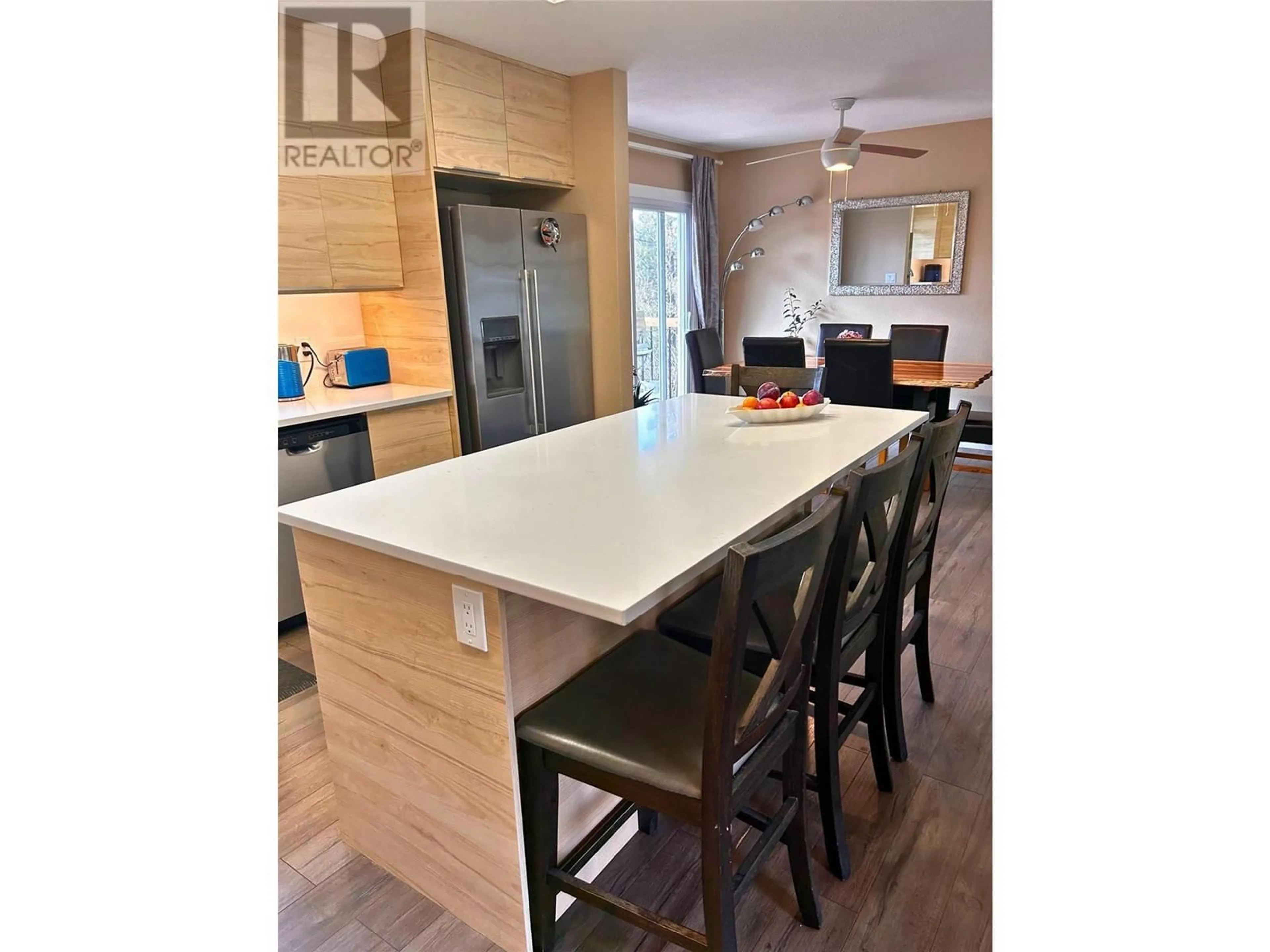 Open concept kitchen, wood/laminate floor for 41 BRECCIA DRIVE, Logan Lake British Columbia V0K1W0